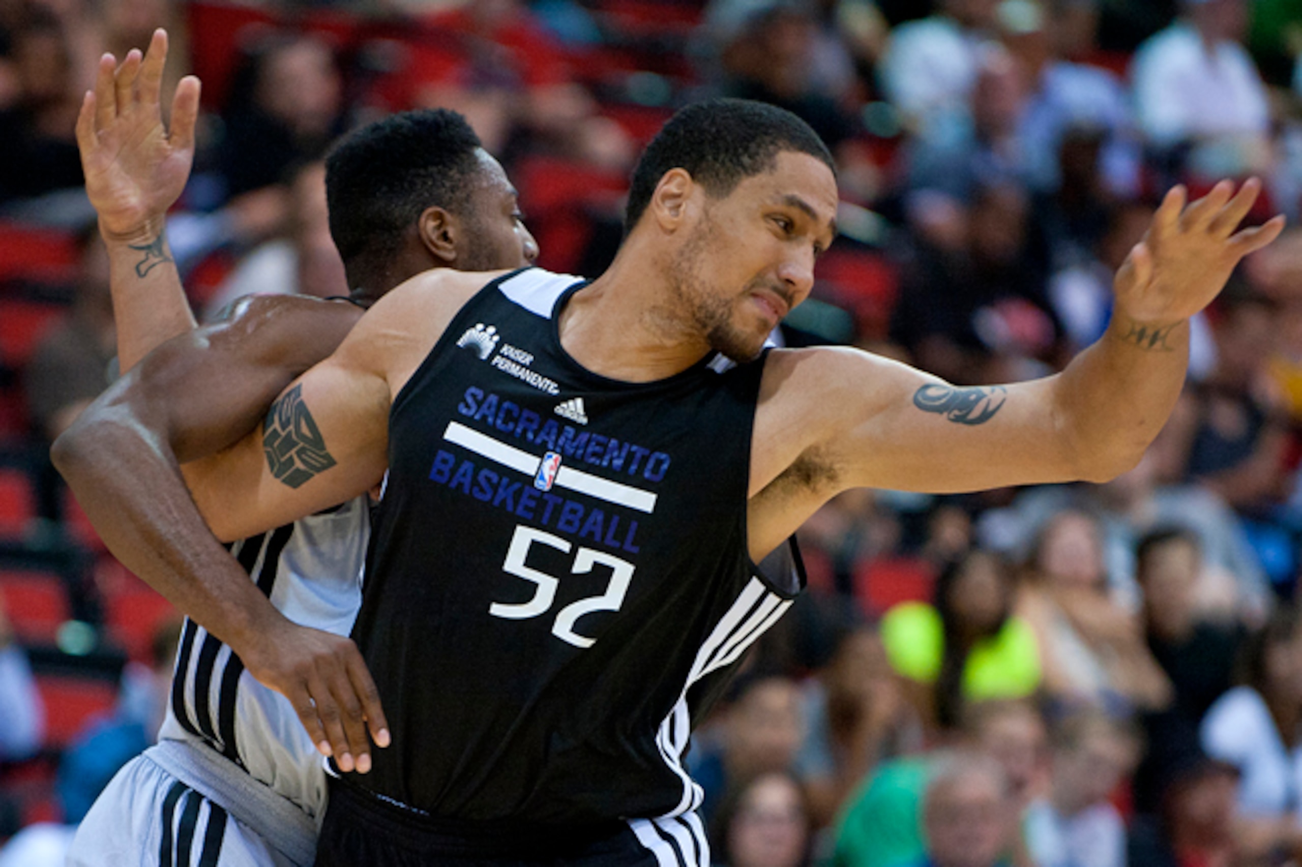 Dwayne Jones battles for inside position in NBA Summer League game against San Antonio.