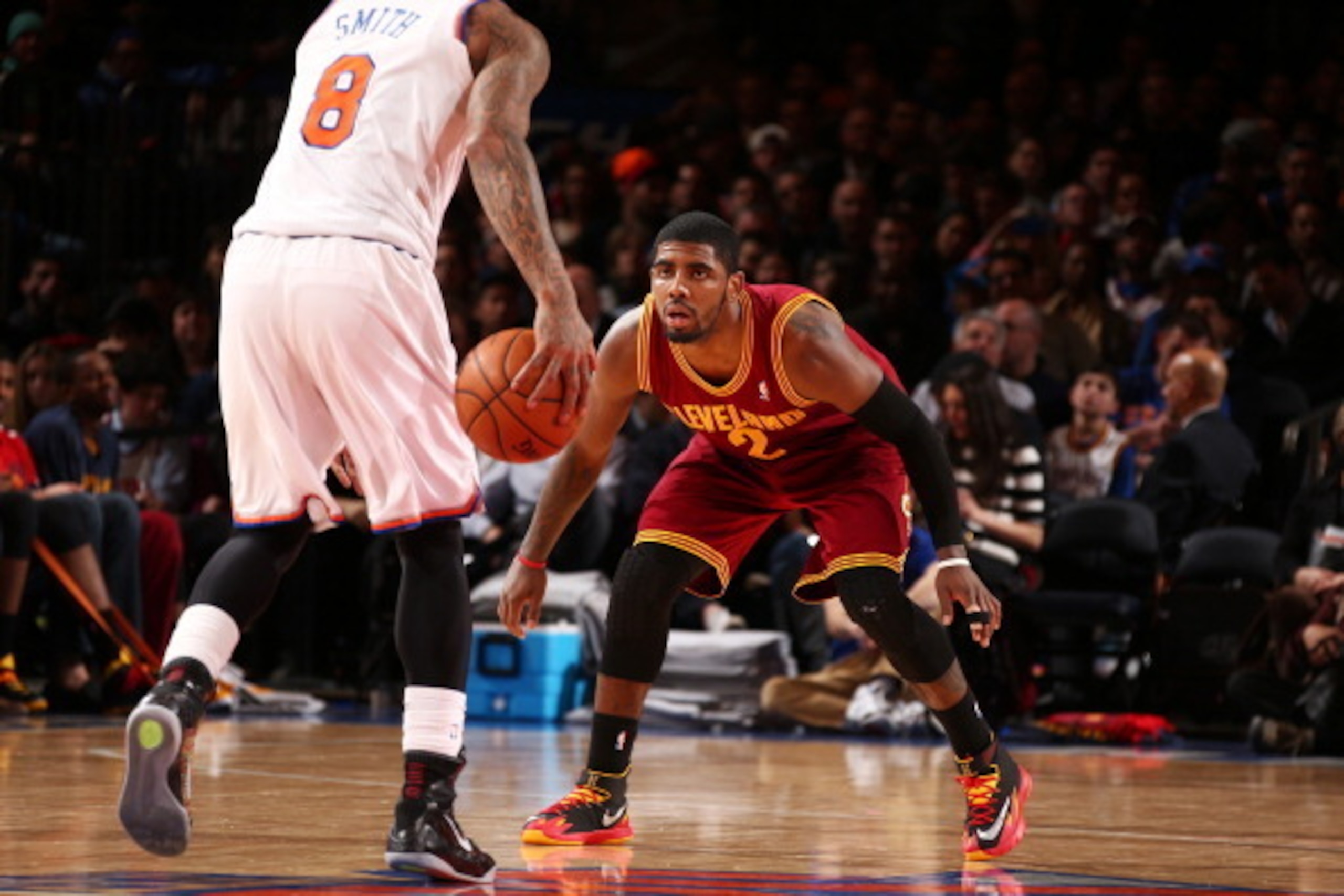 NEW YORK, NY - JANUARY 30: Kyrie Irving #2 of the Cleveland Cavaliers plays defense against J.R. Smith #8 of the New York Knicks during a game at Madison Square Garden in New York City on January 30, 2014.  NOTE TO USER: User expressly acknowledges and ag
