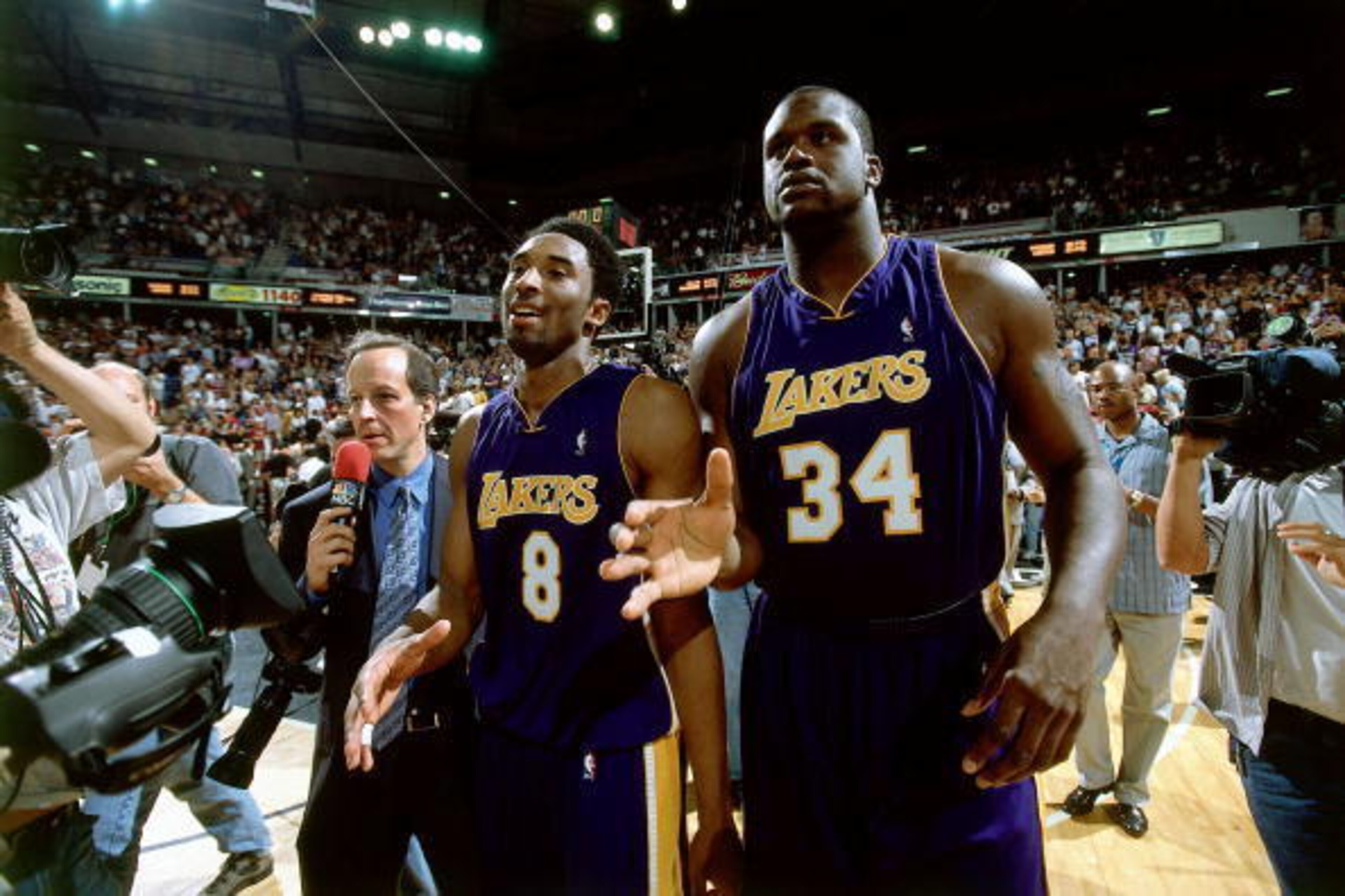 2001: Shaquille O'Neal #34 and Kobe Bryant #8 of the Los Angeles Lakers walk off the court circa 2001. NOTE TO USER: User expressly acknowledges and agrees that, by downloading and/or using this Photograph, User is consenting to the terms and conditions 2001: Shaquille O'Neal #34 and Kobe Bryant #8 of the Los Angeles Lakers walk off the court circa 2001. NOTE TO USER: User expressly acknowledges and agrees that, by downloading and/or using this Photograph, User is consenting to the terms and conditions