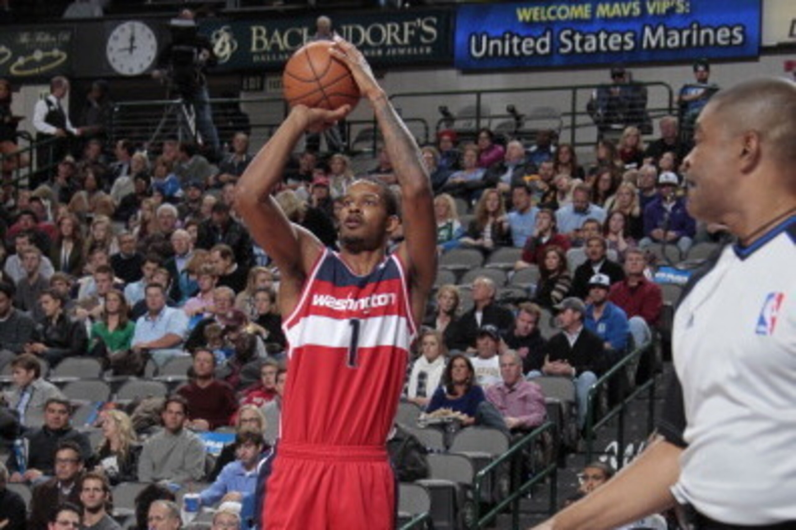 DALLAS, TX - NOVEMBER 12:  Trevor Ariza #1 of the Washington Wizards shoots the ball against the Dallas Mavericks on November 12, 2013 at the American Airlines Center in Dallas, Texas. NOTE TO USER: User expressly acknowledges and agrees that, by download