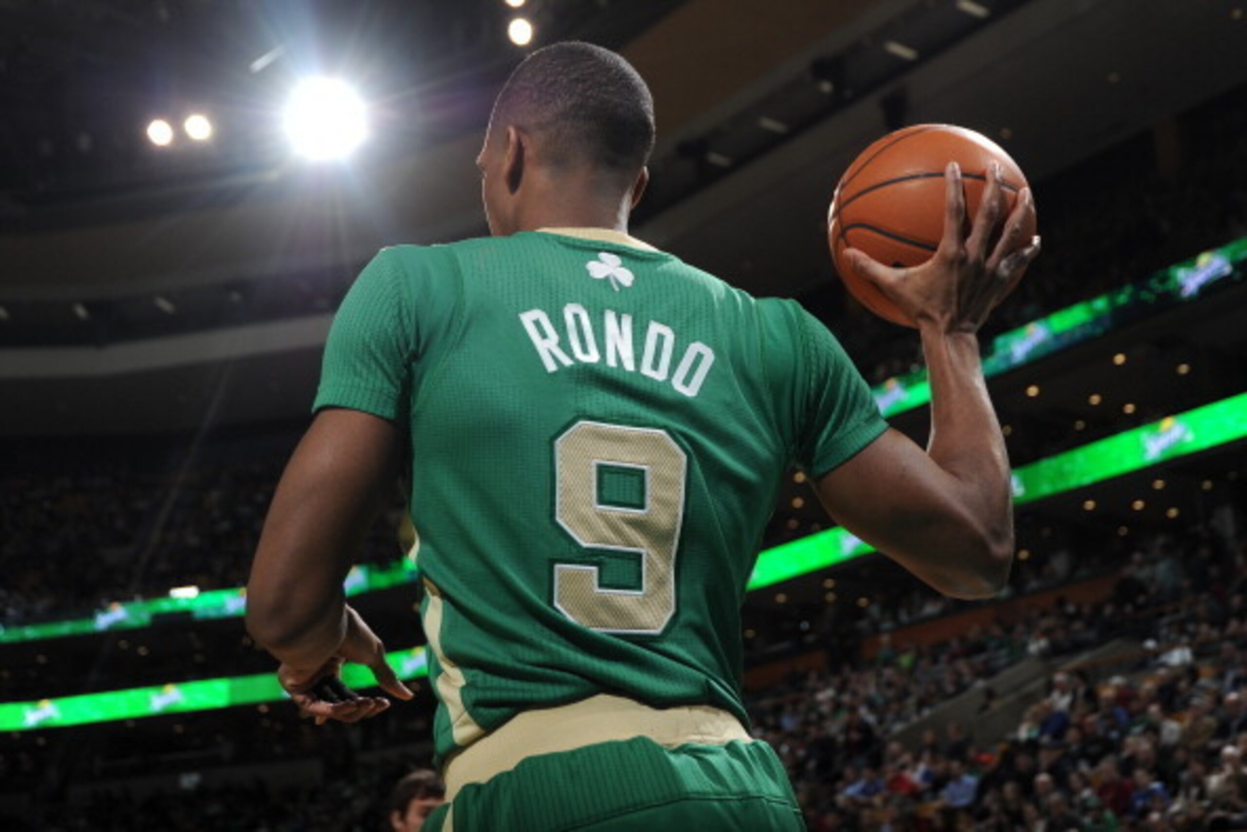 BOSTON, MA - MARCH 14: Rajon Rondo #9 of the Boston Celtics passes the ball against the Phoenix Suns on March 14, 2014 at the TD Garden in Boston, Massachusetts.  NOTE TO USER: User expressly acknowledges and agrees that, by downloading and or using this 