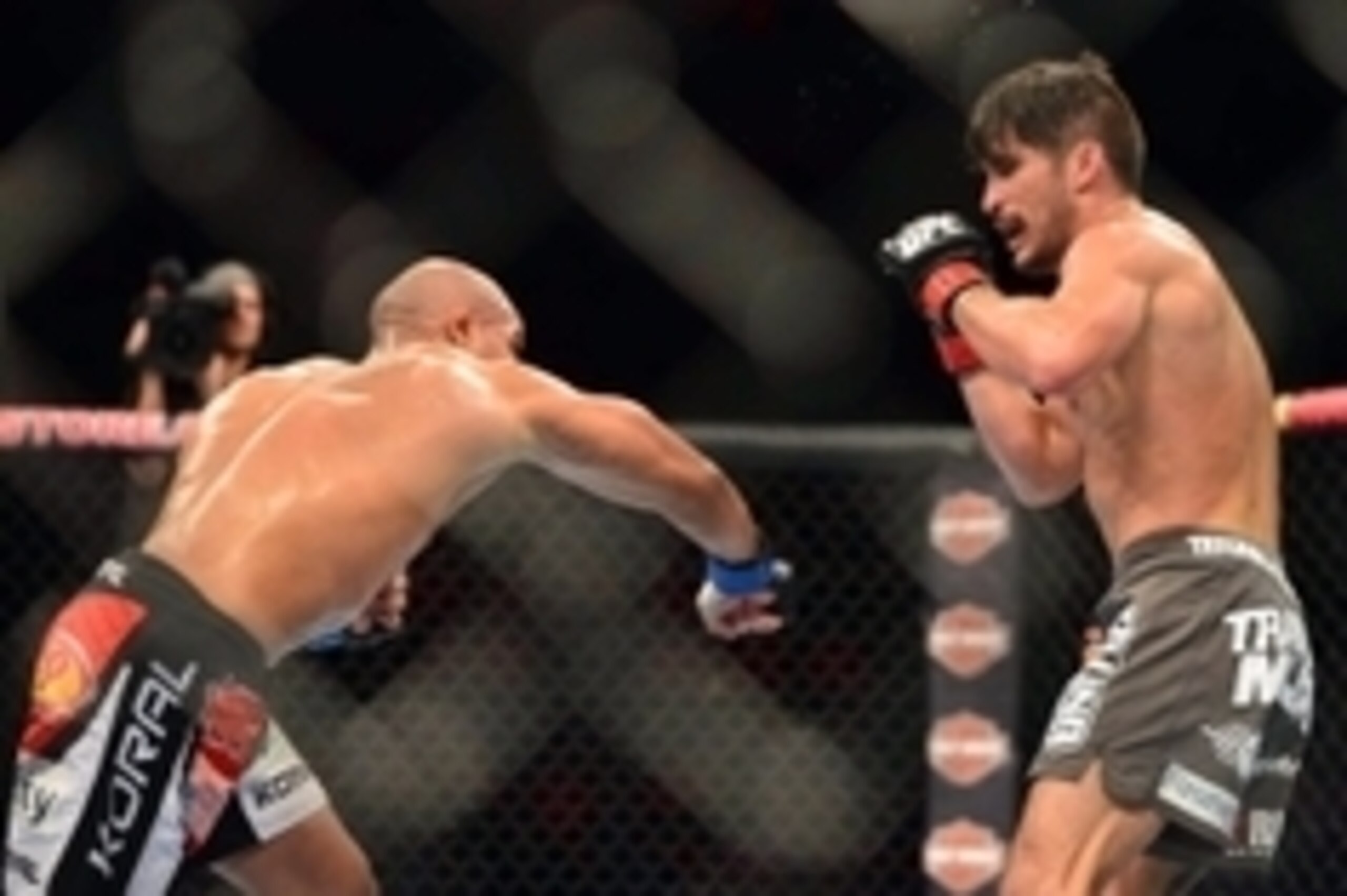 Aug 3, 2013; Rio De Janeiro, Brazil; Ian McCall (red gloves) and Iliarde Santos fight during UFC 163 at HSBC Arena. Mandatory Credit: Jason Silva-USA TODAY Sports