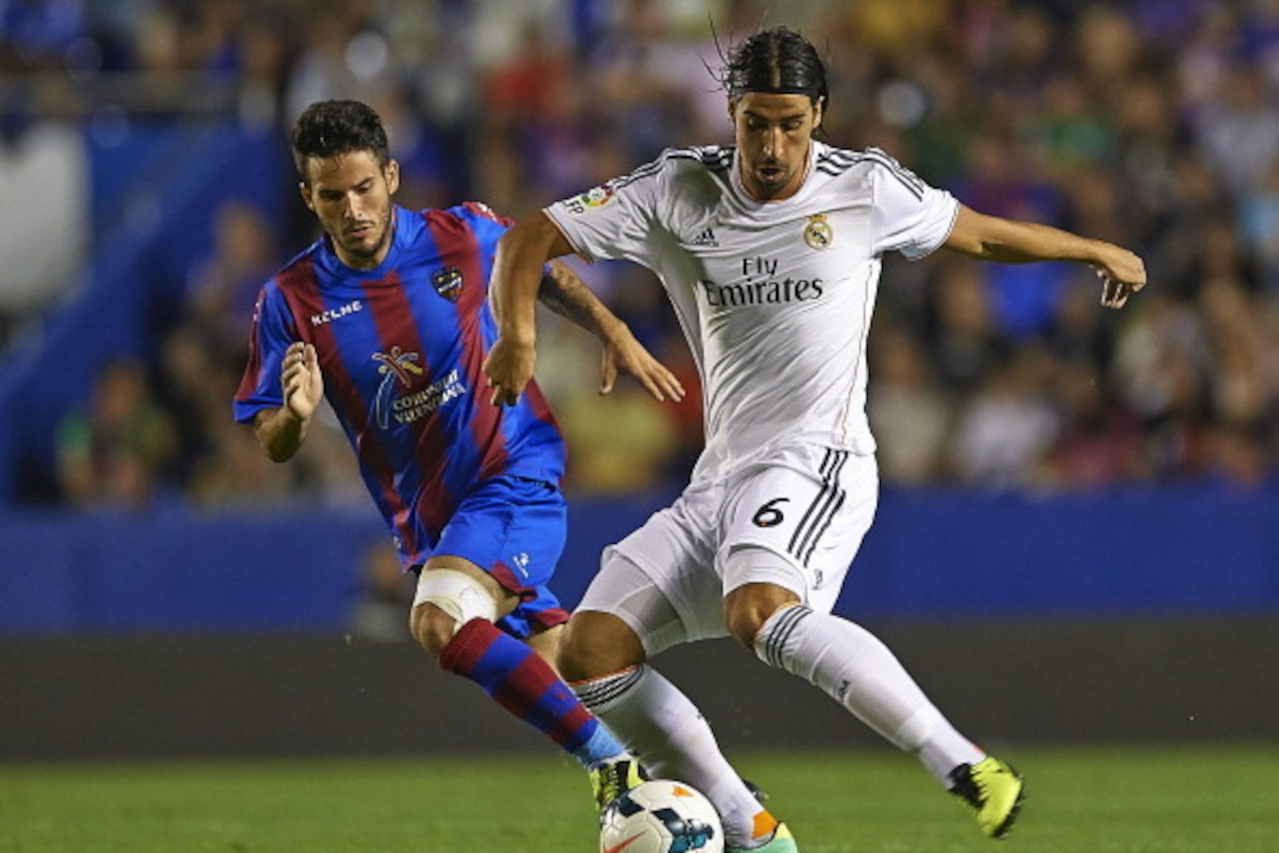 VALENCIA, SPAIN - OCTOBER 05:  Sami Khedira of Real Madrid competes for the ball with Ruben of Levante during the La Liga match between Levante UD and Real Madrid at Ciutat de Valencia on October 5, 2013 in Valencia, Spain.  (Photo by Manuel Queimadelos A