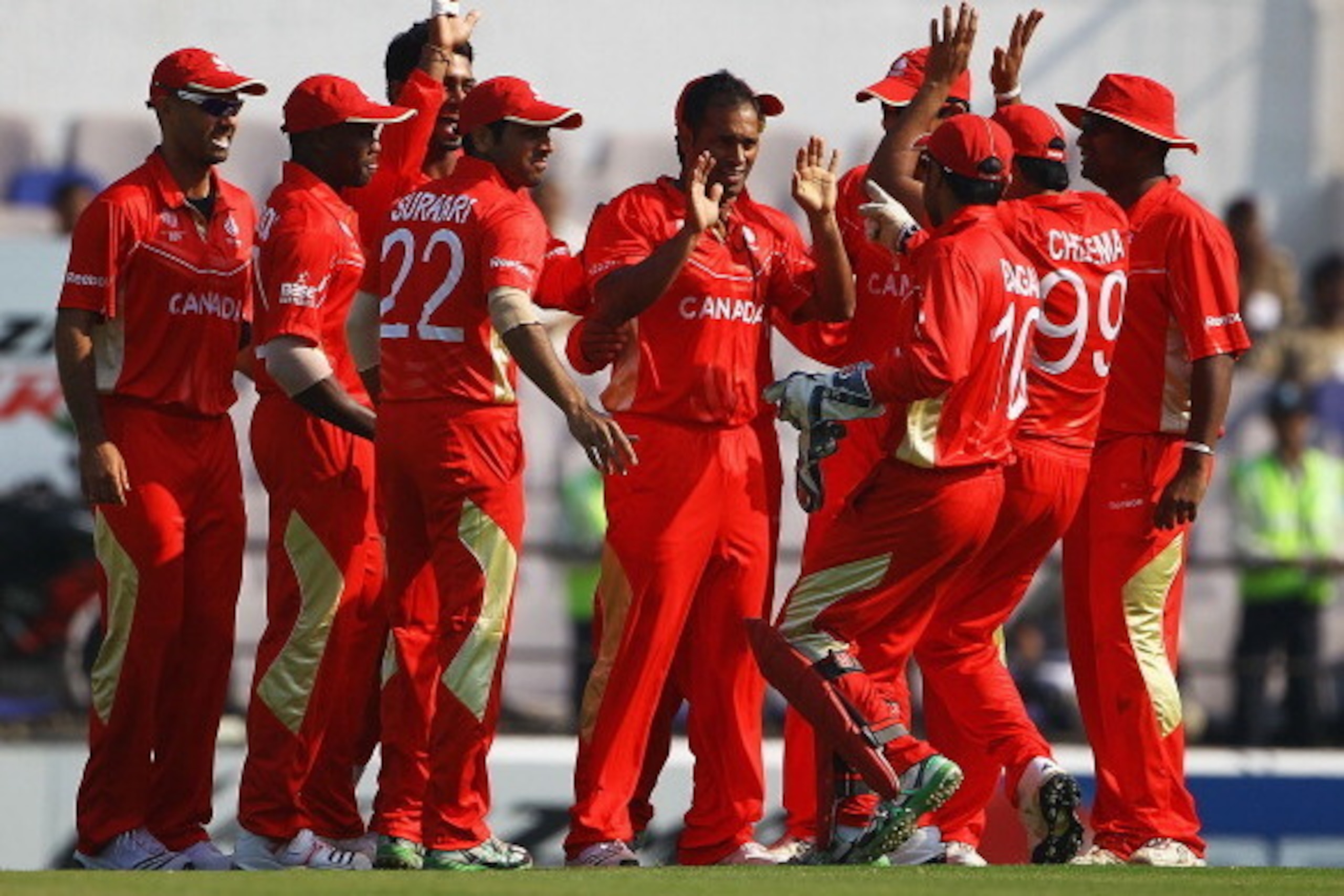 NAGPUR, INDIA - FEBRUARY 28:  Khurram Chohan  (C) of Canada is congratulated by team mates, after bowling Brendan Taylor of Zimbabwe for LBW during the 2011 ICC World Cup Group A game between Canada and Zimbabwe at Vidarbha Cricket Association Ground on F