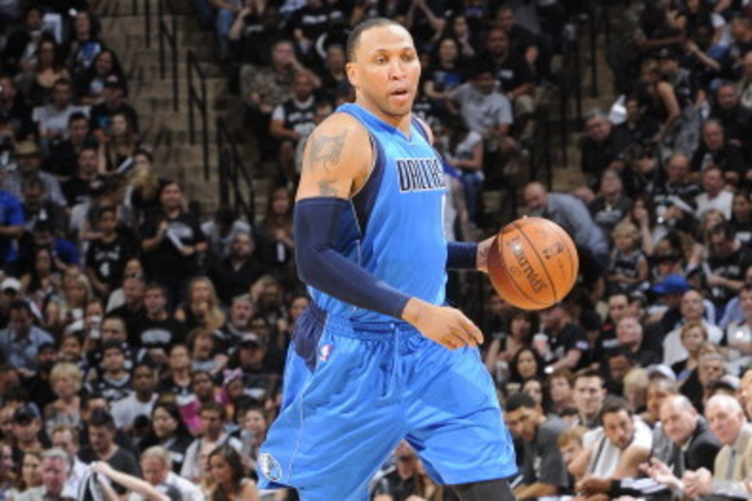 SAN ANTONIO, TX - MAY 4: Shawn Marion #0 of the Dallas Mavericks dribbles up the court against the San Antonio Spurs in Game Seven of the Western Conference Quarterfinals during the 2014 NBA Playoffs on MAY 4, 2014 at the AT&T Center in San Antonio, Texas