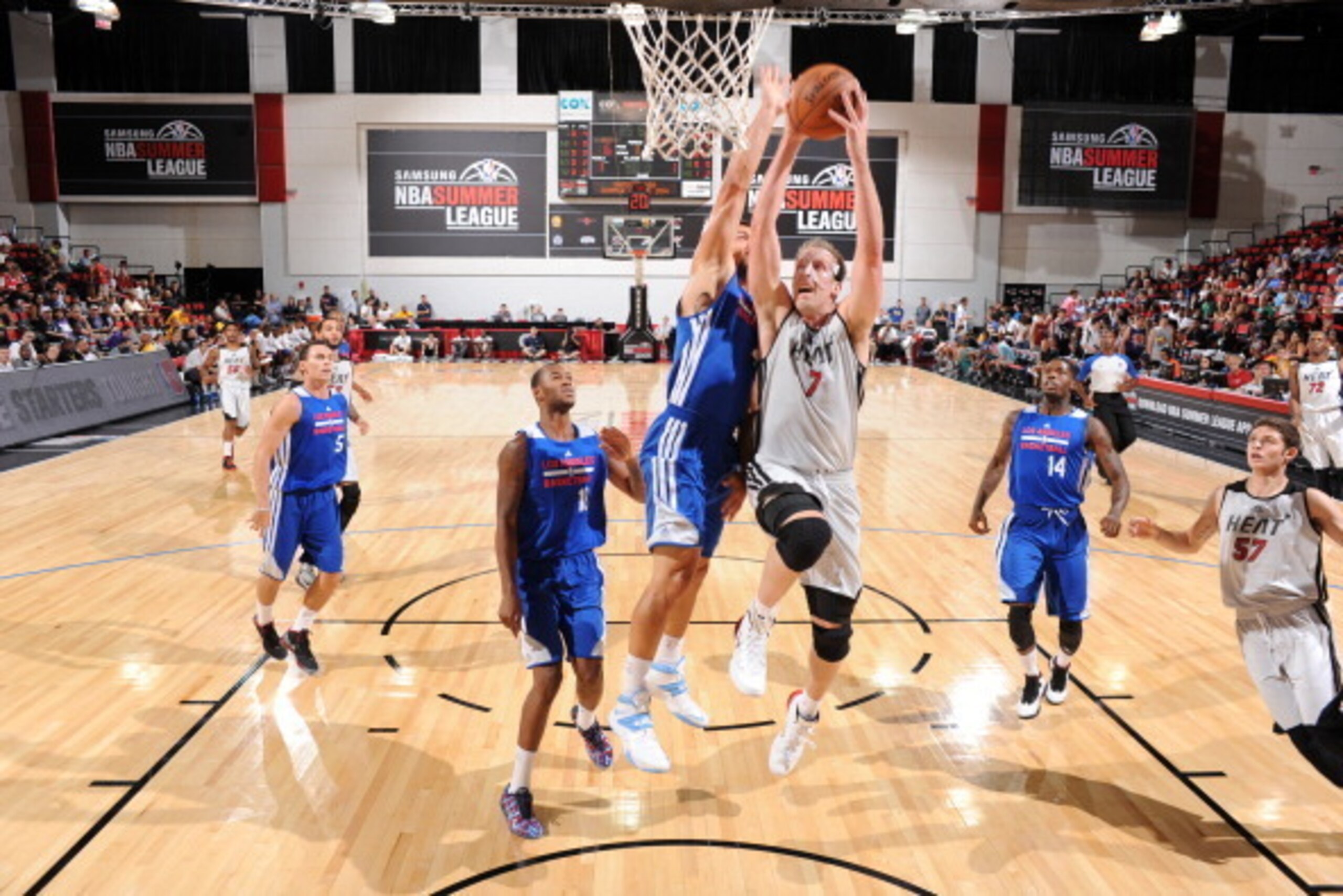 LAS VEGAS, NV - JULY 16: Justin Hamilton #7 of the Miami Heat goes up for a shot against the Los Angeles Clippers on July 16, 2014 at the Cox Pavilion in Las Vegas, Nevada. NOTE TO USER: User expressly acknowledges and agrees that, by downloading and or u