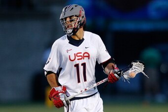 BOSTON, MA - JUNE 26: Paul Rabil #11 of Team USA competes against Team MLL in the fourth quarter during the 2014 MLL All Star Game at Harvard Stadium on June 26, 2014 in Boston, Massachusetts.  (Photo by Jim Rogash/Getty Images)