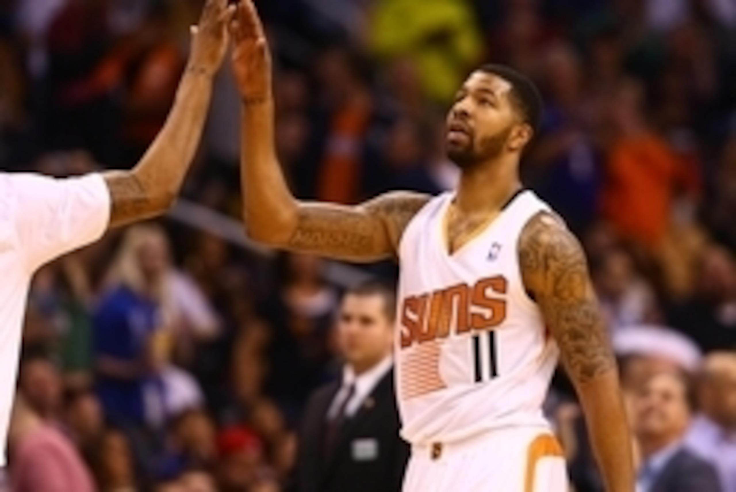 Feb 11, 2014; Phoenix, AZ, USA; Phoenix Suns forward Markieff Morris (11) against the Miami Heat at the US Airways Center. The Heat defeated the Suns 103-97. Mandatory Credit: Mark J. Rebilas-USA TODAY Sports
