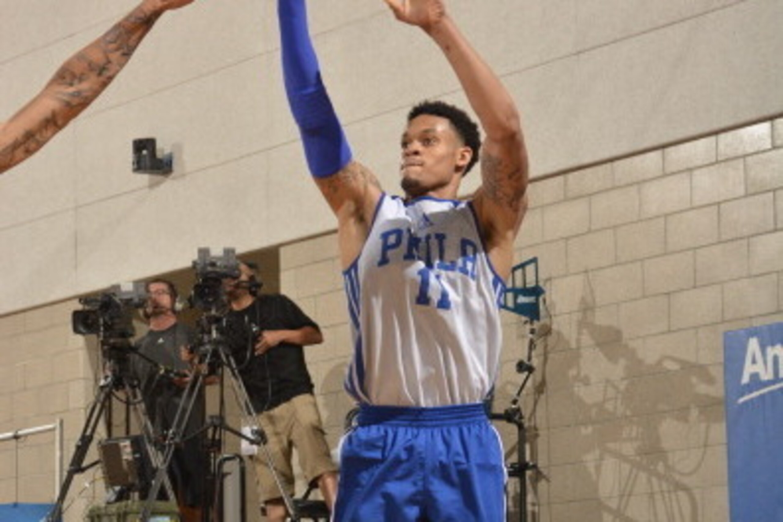 ORLANDO, FL - JULY 8: K.J. McDaniels #11 of the Philadelphia 76ers takes a shot against the Houston Rockets during the Samsung NBA Summer League 2014 on July 8, 2014 at Amway Center in Orlando, Florida. NOTE TO USER: User expressly acknowledges and agrees