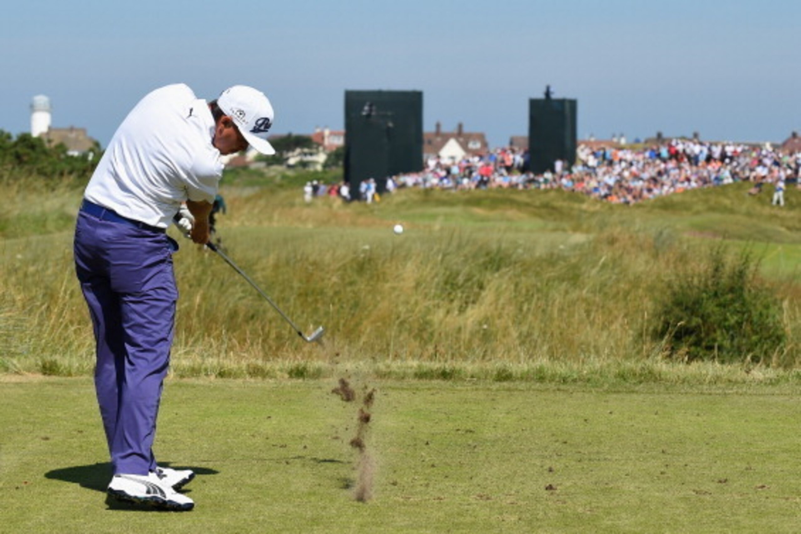 HOYLAKE, ENGLAND - JULY 17:  Rickie Fowler of the United States hits his tee shot on the 13th hole during the first round of The 143rd Open Championship at Royal Liverpool on July 17, 2014 in Hoylake, England.  (Photo by Stuart Franklin/Getty Images)