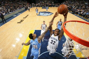 MEMPHIS, TN - DECEMBER 28: Ed Davis #32 of the Memphis Grizzlies dunks against the Denver Nuggets on December 28, 2013 at FedExForum in Memphis, Tennessee. NOTE TO USER: User expressly acknowledges and agrees that, by downloading and or using this photogr