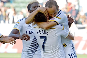 May 25, 2014; Carson, CA, USA;  Los Angeles Galaxy forward Landon Donovan (10) gets a hug from forward Robbie Keane (7) after scoring his  record breaking 135th MLS goal in the second half of the game against the Philadelphia Union at StubHub Center. Mand