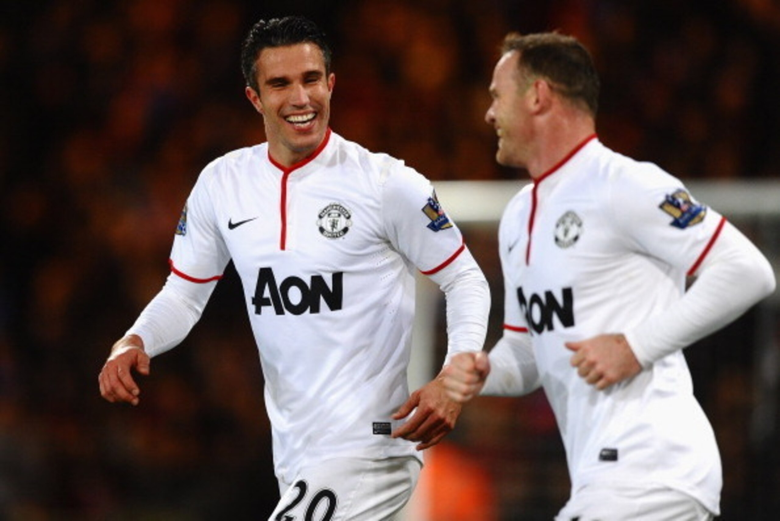 LONDON, ENGLAND - FEBRUARY 22:  Robin Van Persie of Manchester United celebrates the first goal with Wayne Rooney during the Barclays Premier League match between Crystal Palace and Manchester United at Selhurst Park on February 22, 2014 in London, Englan