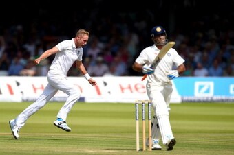LONDON, ENGLAND - JULY 17:  India batsman Mahendra Singh Dhoni  is dismissed by Stuart Broad during day one of 2nd Investec Test match between England and India at Lord's Cricket Ground on July 17, 2014 in London, United Kingdom.  (Photo by Stu Forster/Ge