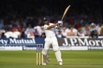 LONDON, ENGLAND - JULY 17:  India batsman Ajinkya Rahane cuts a ball to the boundary during day one of 2nd Investec Test match between England and India at Lord's Cricket Ground on July 17, 2014 in London, United Kingdom.  (Photo by Stu Forster/Getty Imag