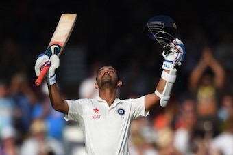 LONDON, ENGLAND - JULY 17:  India batsman Ajinkya Rahane celebrates after reaching his century during day one of 2nd Investec Test match between England and India at Lord's Cricket Ground on July 17, 2014 in London, United Kingdom.  (Photo by Stu Forster/