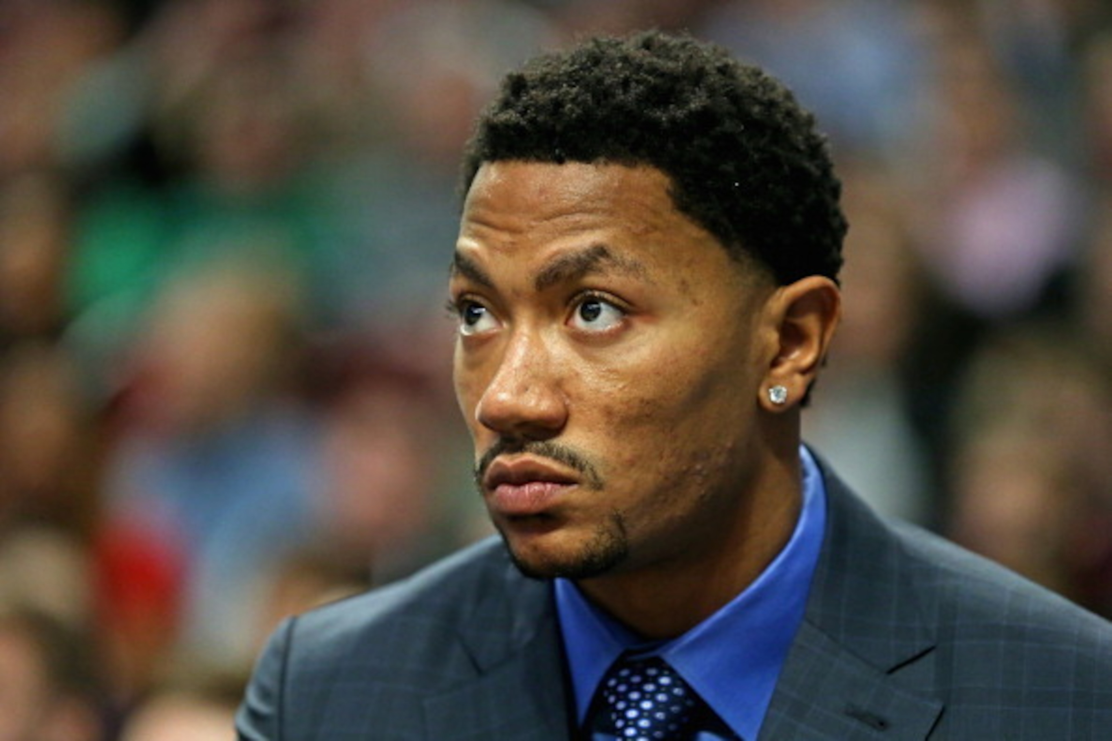 CHICAGO, IL - MARCH 17: Derrick Rose #1 of the Chicago Bulls watches his teammates from the bench during a game against the Oklahoma City Thunder at the United Center on March 17, 2014 in Chicago, Illinois. The Thunder defeated the Bulls 97-85. NOTE TO U CHICAGO, IL - MARCH 17: Derrick Rose #1 of the Chicago Bulls watches his teammates from the bench during a game against the Oklahoma City Thunder at the United Center on March 17, 2014 in Chicago, Illinois. The Thunder defeated the Bulls 97-85. NOTE TO U