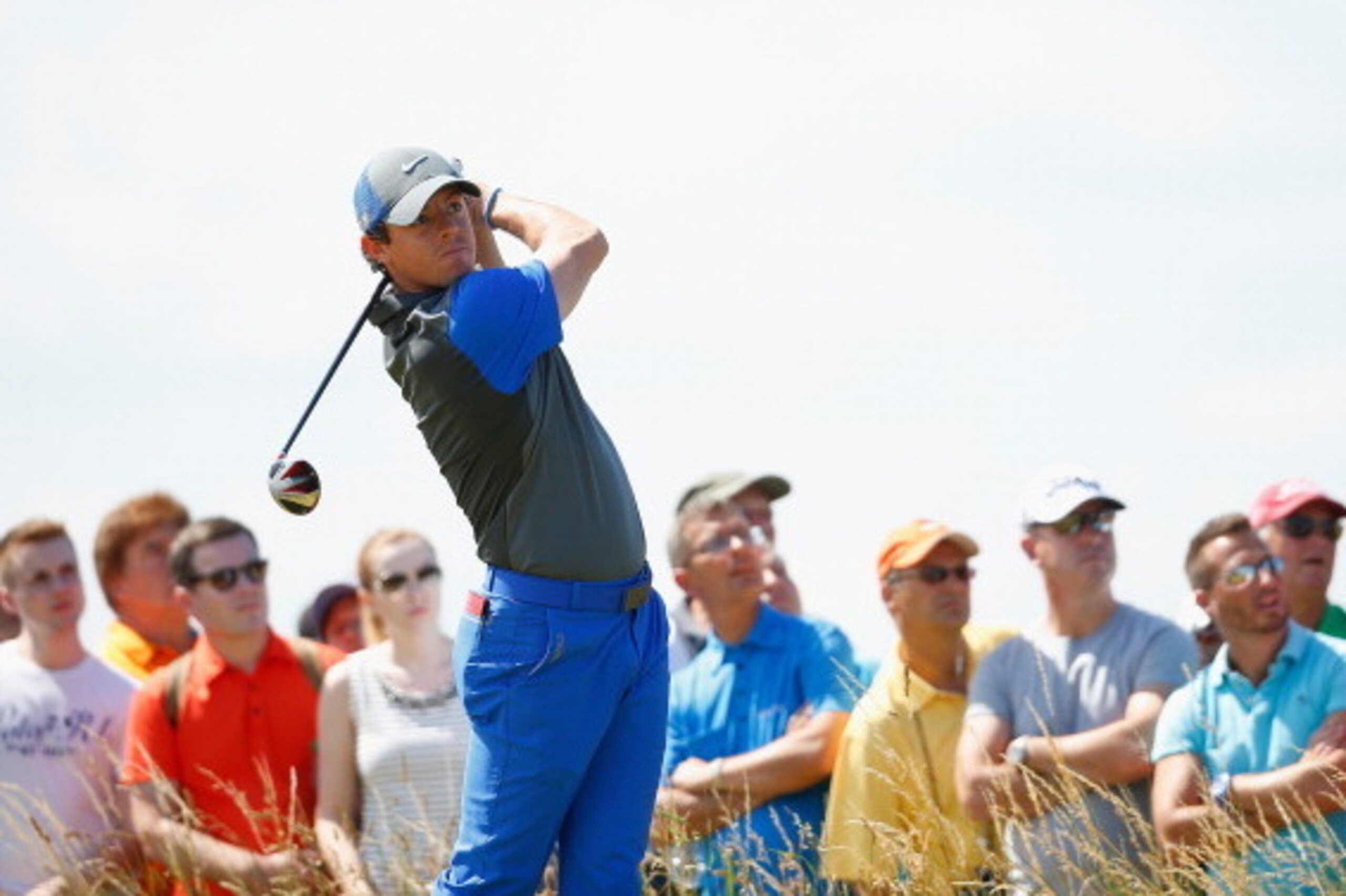 HOYLAKE, ENGLAND - JULY 17:  Rory McIlroy of Northern Ireland tees off during the first round of The 143rd Open Championship at Royal Liverpool on July 17, 2014 in Hoylake, England.  (Photo by Tom Pennington/Getty Images)