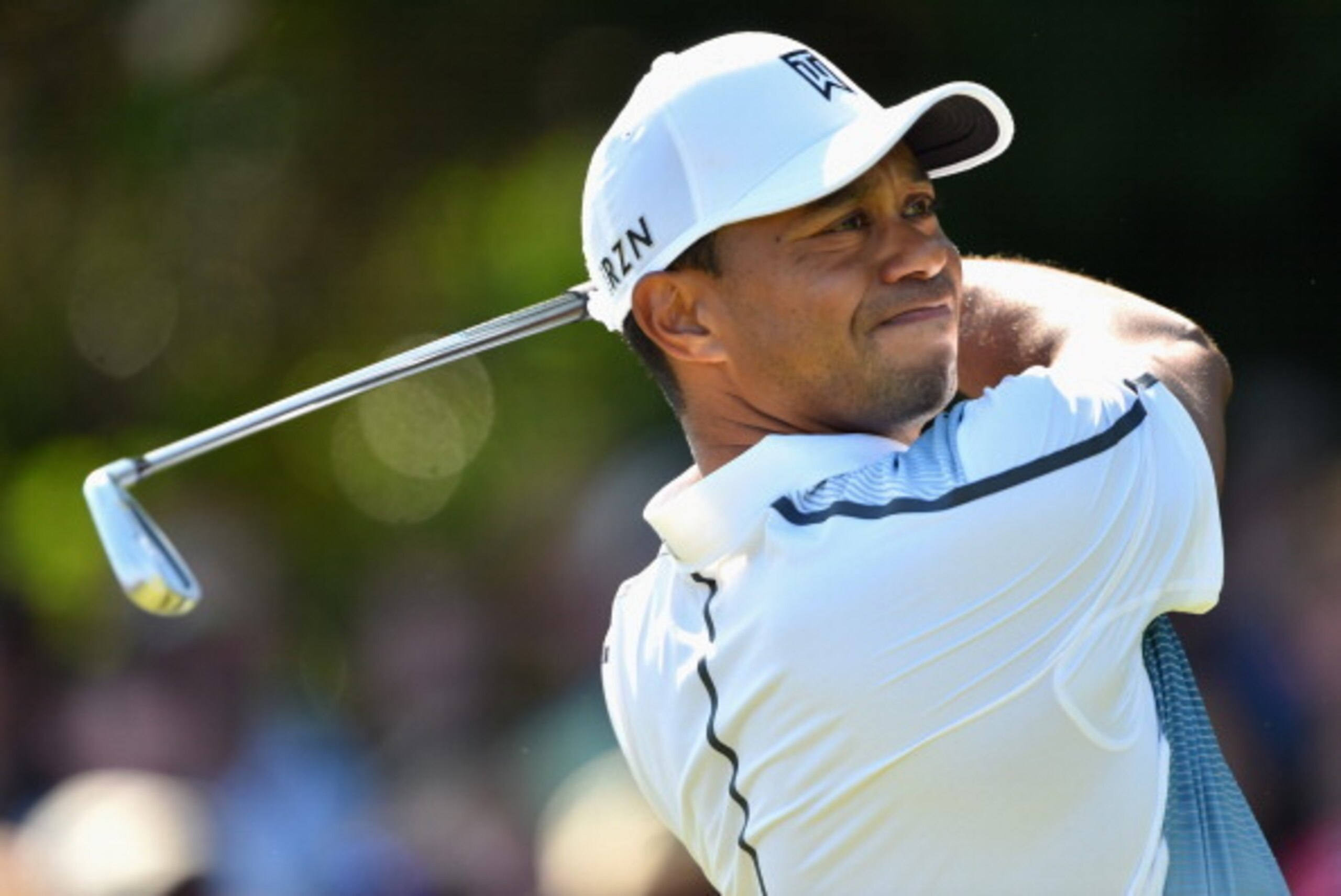 HOYLAKE, ENGLAND - JULY 17:  Tiger Woods of the United States tees off on the 4th hole during the first round of The 143rd Open Championship at Royal Liverpool on July 17, 2014 in Hoylake, England.  (Photo by Stuart Franklin/Getty Images)