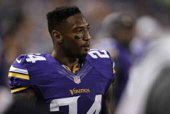 MINNEAPOLIS, MN - AUGUST 29: A.J. Jefferson #24 of the Minnesota Vikings looks on during the second half of the game against the Tennessee Titans on August 29, 2013 at Mall of America Field at the Hubert H. Humphrey Metrodome in Minneapolis, Minnesota. (P