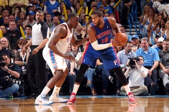 OKLAHOMA CITY, OK - APRIL 16: Greg Monroe #10 of the Detroit Pistons controls the ball against the Oklahoma City Thunder on April 16, 2014 at the Chesapeake Energy Arena in Oklahoma City, Oklahoma. NOTE TO USER: User expressly acknowledges and agrees that