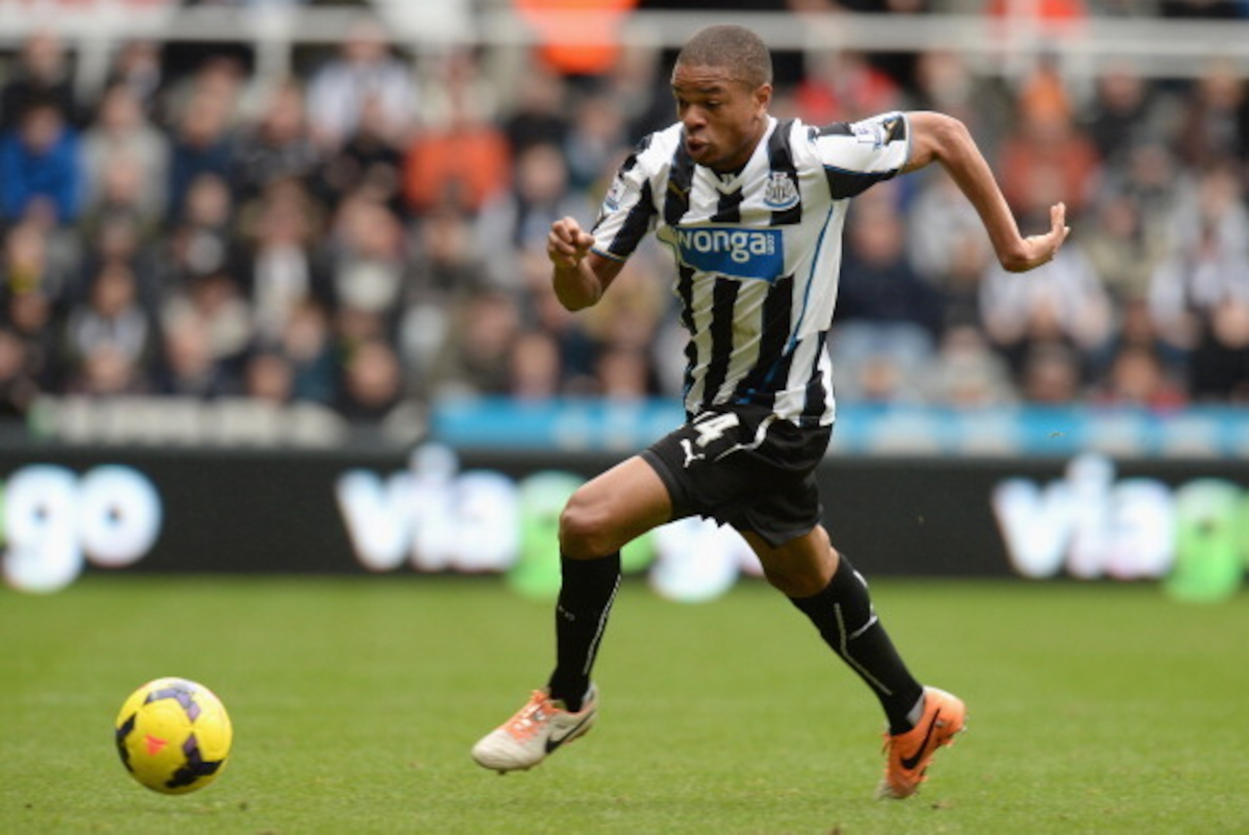 NEWCASTLE UPON TYNE, ENGLAND - FEBRUARY 23:  Loic Remy of Newcastle United runs with the ball during the Barclays Premier League match between Newcastle United and Aston Villa at St James' Park on February 23, 2014 in Newcastle upon Tyne, England.  (Photo