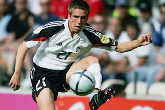 PORTO, PORTUGAL - JUNE 19:  Philipp Lahm of Germany controls the ball during the UEFA Euro 2004 Group D match between Latvia and Germany on June 19, 2004 at the Estadio do Bessa Sec XXI in Porto, Portugal. (Photo by Shaun Botterill/Getty Images)