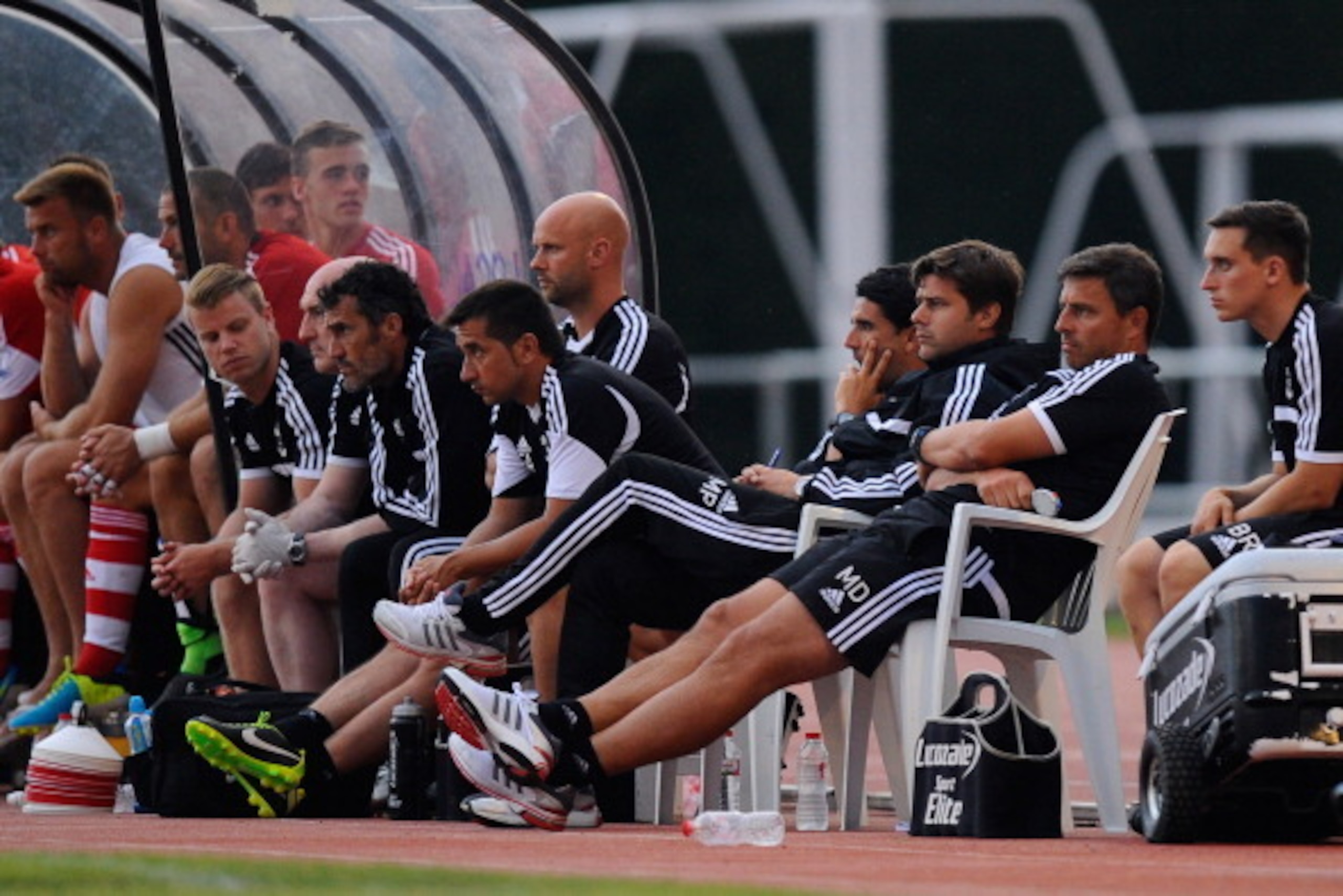 GIRONA, SPAIN - JULY 17:  Manager Mauricio Pochettino (3rdR) of Southampton looks on during a friendly match between Southampton FC and UE Llagostera at the Josep Pla i Arbones Stadium on July 17, 2013 in Girona, Spain.  (Photo by David Ramos/Getty Images