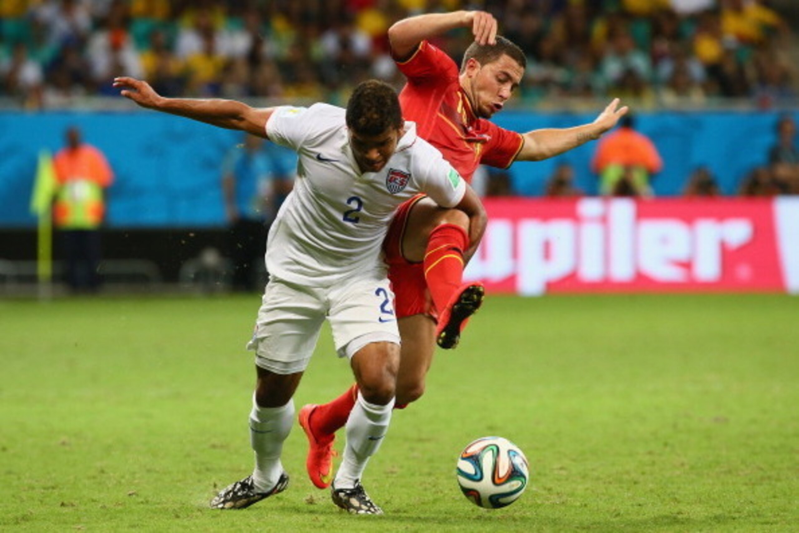 SALVADOR, BRAZIL - JULY 01: DeAndre Yedlin of the United States and Eden Hazard of Belgium compete for the ball during the 2014 FIFA World Cup Brazil Round of 16 match between Belgium and the United States at Arena Fonte Nova on July 1, 2014 in Salvador, 