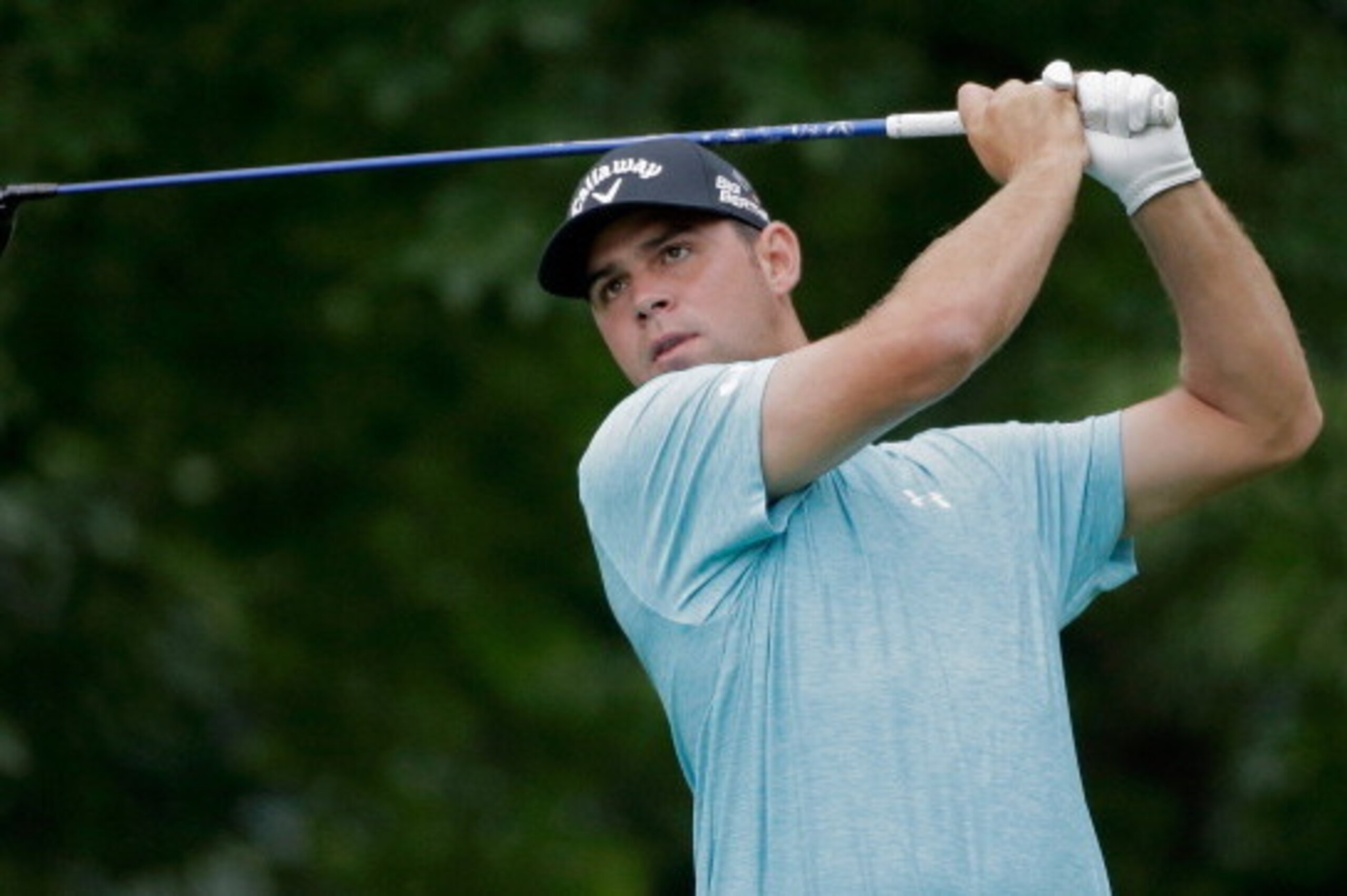 WHITE SULPHUR SPRINGS, WV - JULY 04: Gary Woodland tees off on the second hole during the second round of the Greenbrier Classic at the Old White TPC on July 4, 2014 in White Sulphur Springs, West Virginia.  (Photo by Jon Durr/Getty Images)