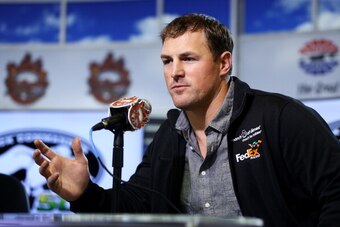 FORT WORTH, TX - APRIL 06:  Dallas Cowboys tight end Jason Witten speaks during a March of Dimes press conference with Denny Hamlin, driver of the #11 FedEx Office/March of Dimes Toyota, at Texas Motor Speedway on April 6, 2014 in Fort Worth, Texas.  (Pho