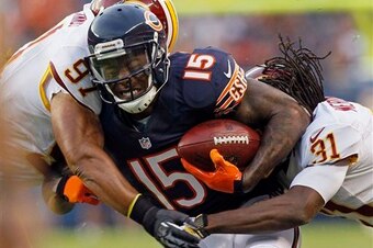 Brandon Meriweather (right) and Brandon Marshall