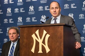 Cashman at Carlos Beltran's introductory press conference, with president Randy Levine to his right. Cashman at Carlos Beltran's introductory press conference, with president Randy Levine to his right.