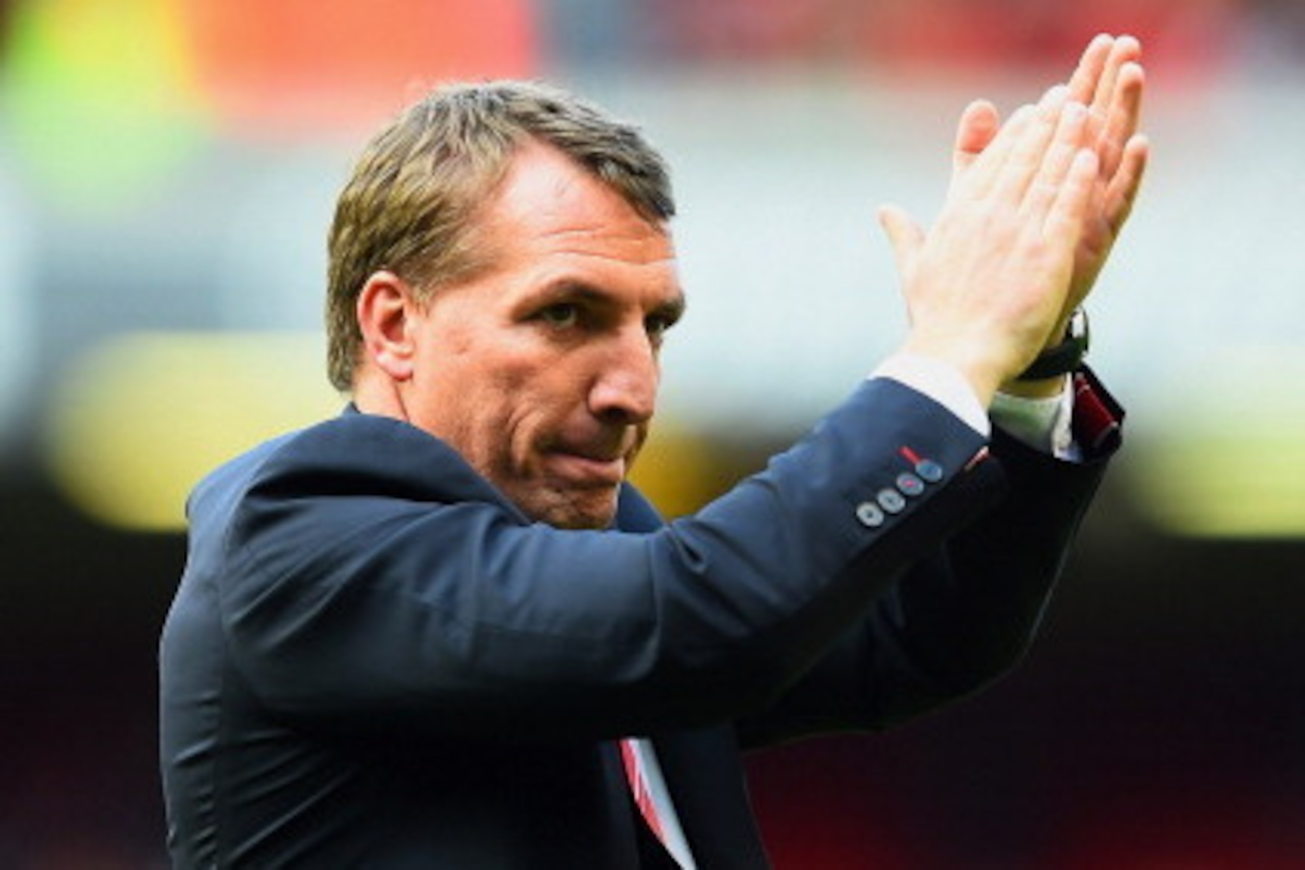 LIVERPOOL, ENGLAND - MAY 11:  Brendan Rodgers manager of Liverpool applauds the crowd after the Barclays Premier League match between Liverpool and Newcastle United at Anfield on May 11, 2014 in Liverpool, England. Liverpool finish as runners-up in the Pr
