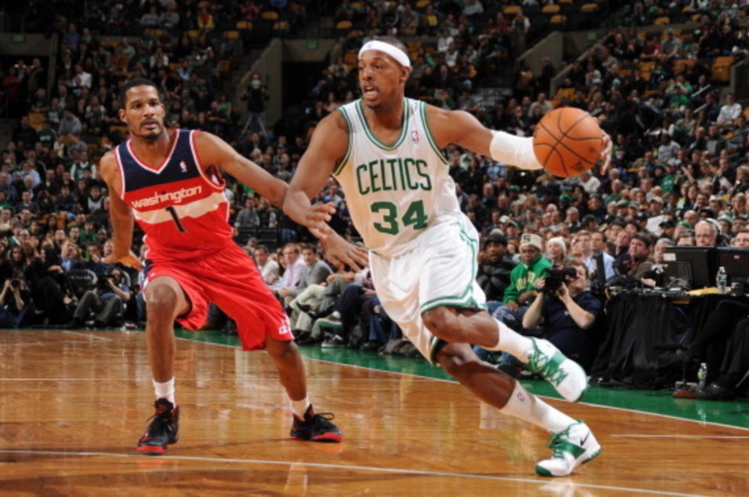 BOSTON - NOVEMBER 7: Paul Pierce #34 of the Boston Celtics drives to the hoop against Trevor Ariza #1 of the Washington Wizards on November 7, 2012 at the TD Garden in Boston, Massachusetts.  NOTE TO USER: User expressly acknowledges and agrees that, by d