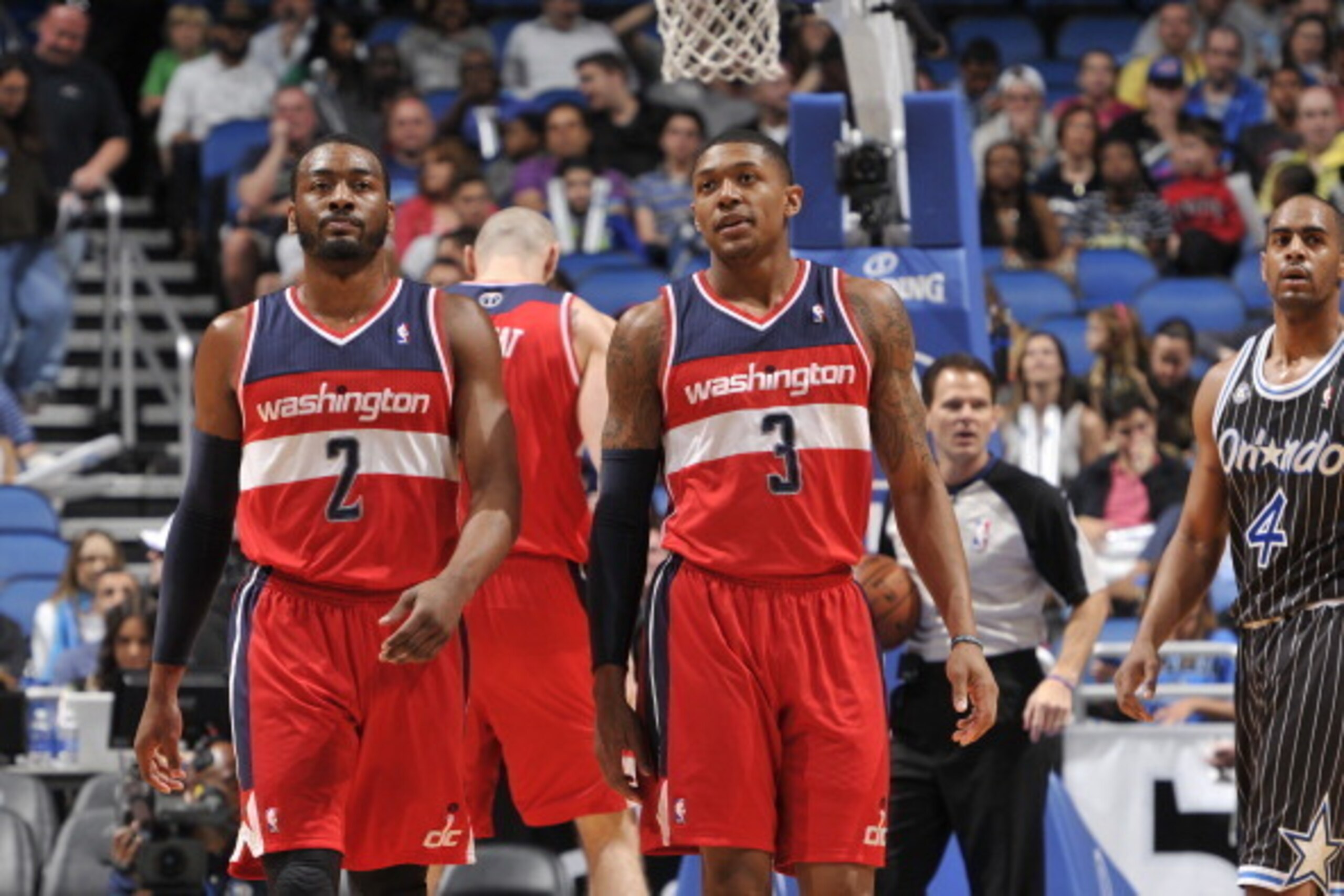 ORLANDO, FL - MARCH 14:  John Wall #2 and Bradley Beal #3 of the Washington Wizards look on against the Orlando Magic during the game on March 14, 2014 at Amway Center in Orlando, Florida. NOTE TO USER: User expressly acknowledges and agrees that, by down