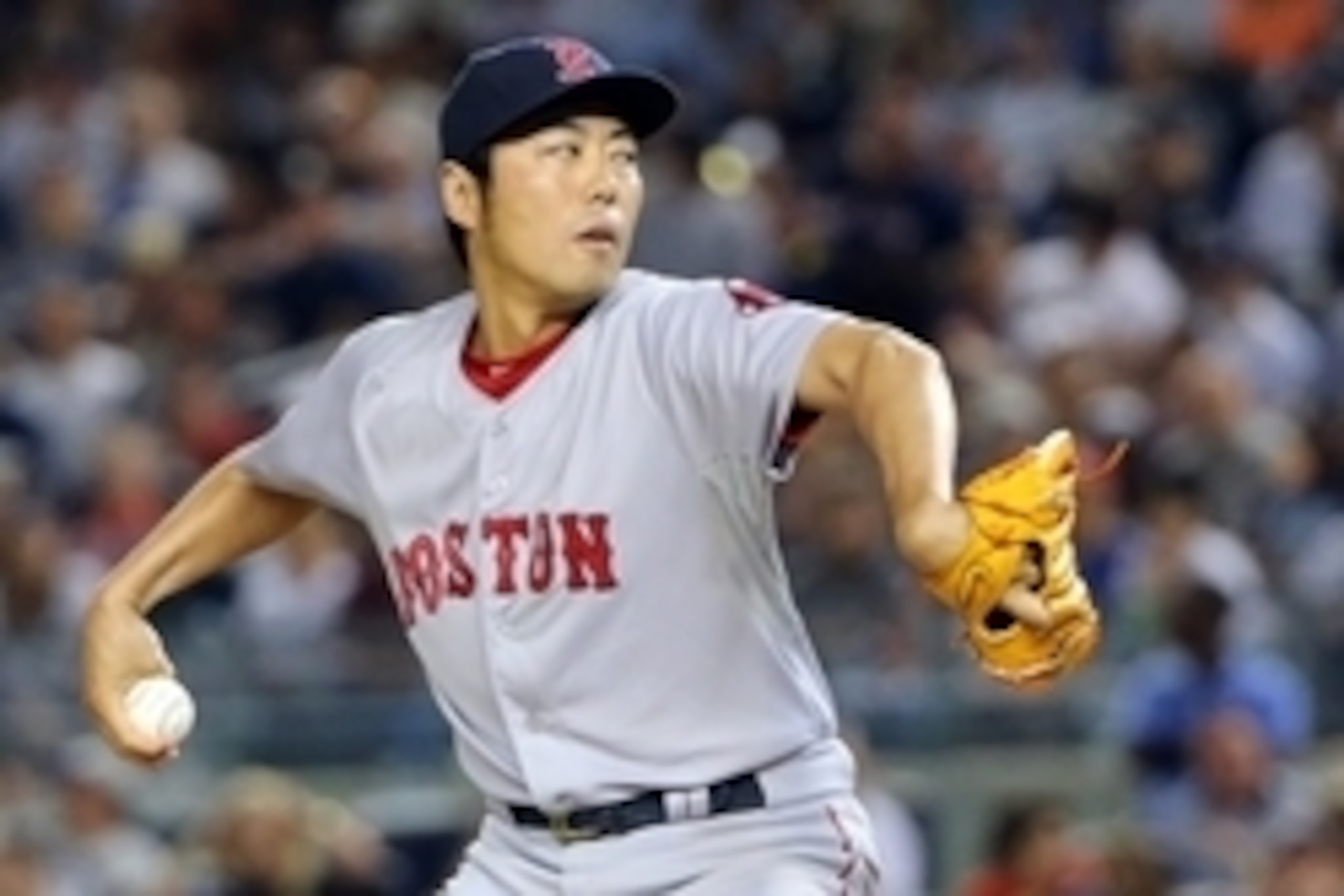 Jun 28, 2014; Bronx, NY, USA;  Boston Red Sox relief pitcher Koji Uehara (19) delivers a pitch during the ninth inning against the New York Yankees at Yankee Stadium. Boston Red Sox won 2-1. Mandatory Credit: Anthony Gruppuso-USA TODAY Sports