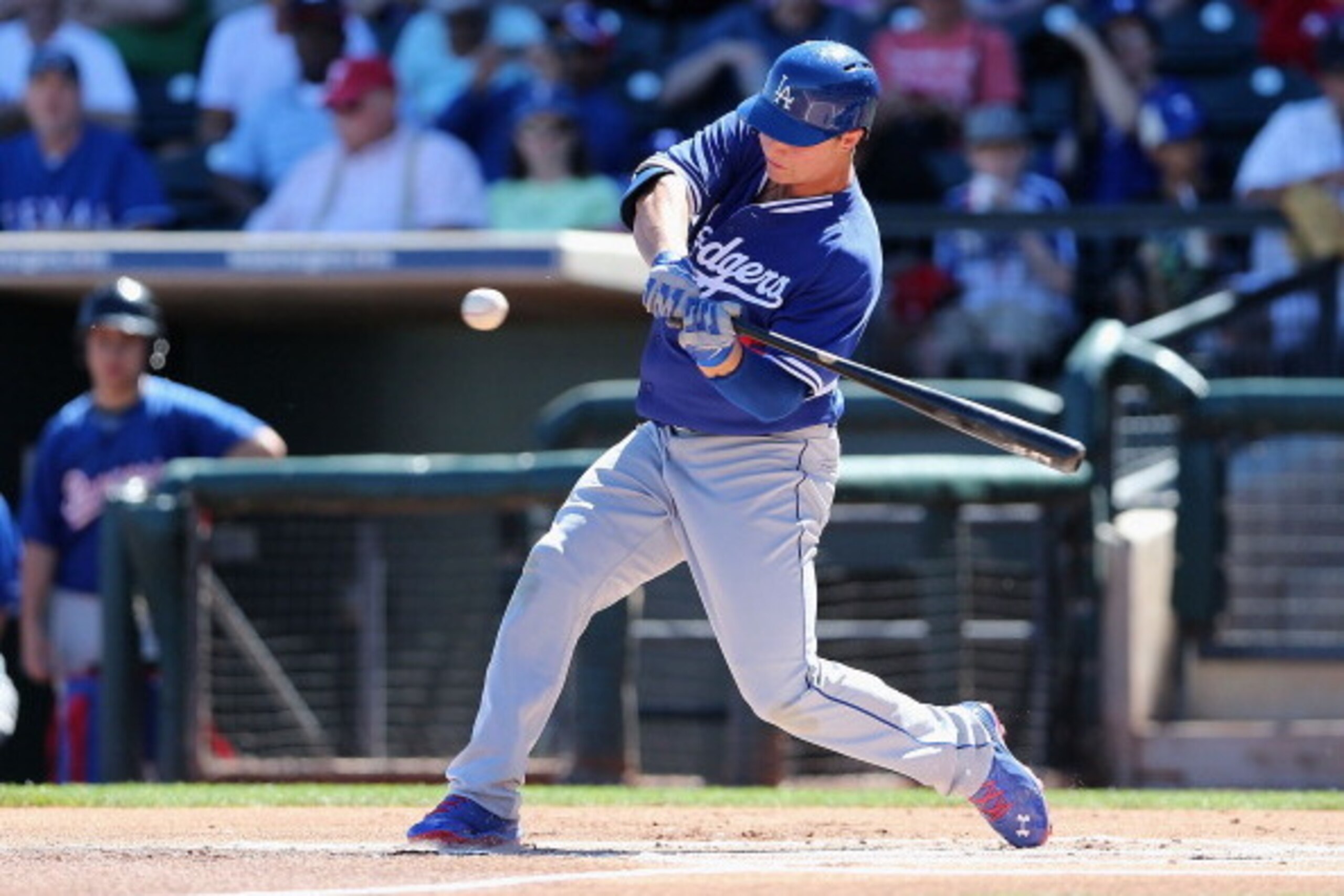 SURPRISE, AZ - MARCH 08:  Joc Pederson #65 of the Los Angeles Dodgers bats against the Texas Rangers during the spring training game at Surprise Stadium on March 8, 2014 in Surprise, Arizona.  (Photo by Christian Petersen/Getty Images)