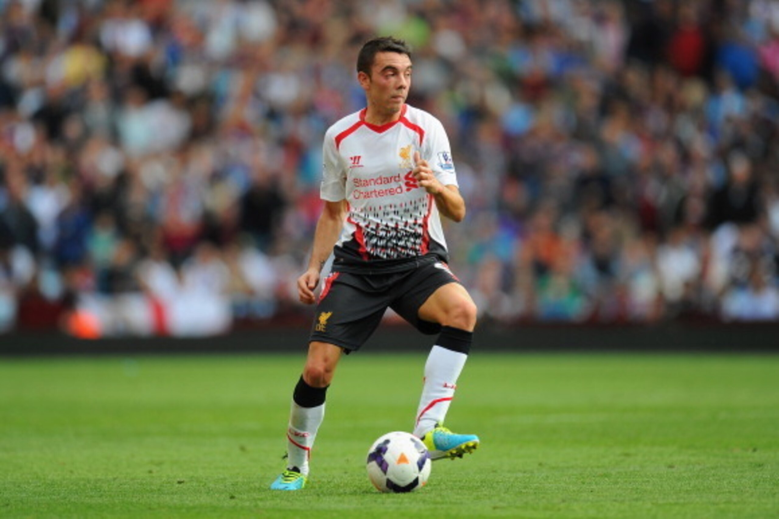 BIRMINGHAM, ENGLAND - AUGUST 24:  Liverpool player Iago Aspas in action during the Barclays Premier League match between Aston Villa and Liverpool at Villa Park on August 24, 2013 in Birmingham, England.  (Photo by Stu Forster/Getty Images)