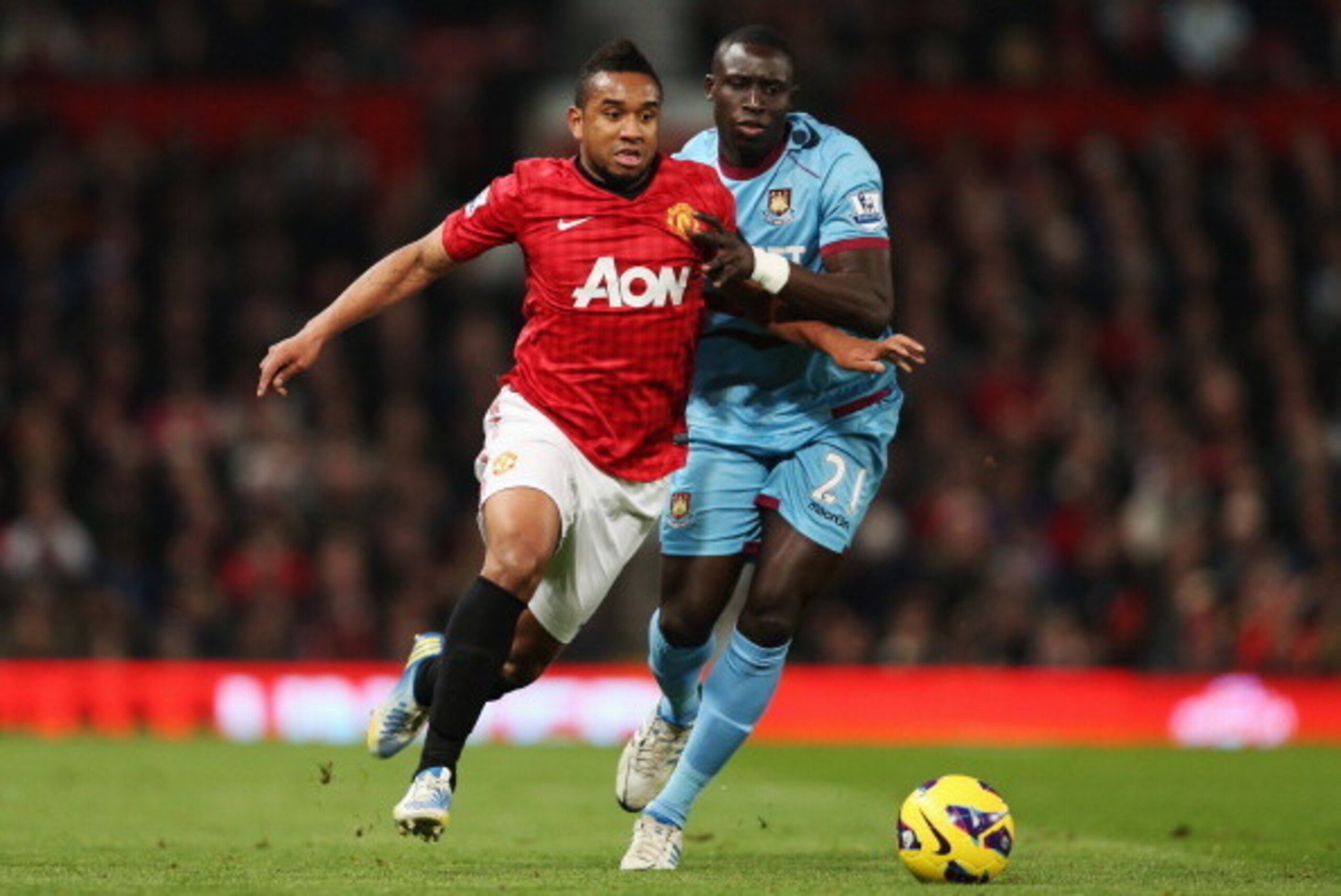 MANCHESTER, ENGLAND - NOVEMBER 28:  Anderson of Manchester United battles with Mohamed Diame of West Ham United during the Barclays Premier League match between Manchester United and West Ham United at Old Trafford on November 28, 2012 in Manchester, Engl