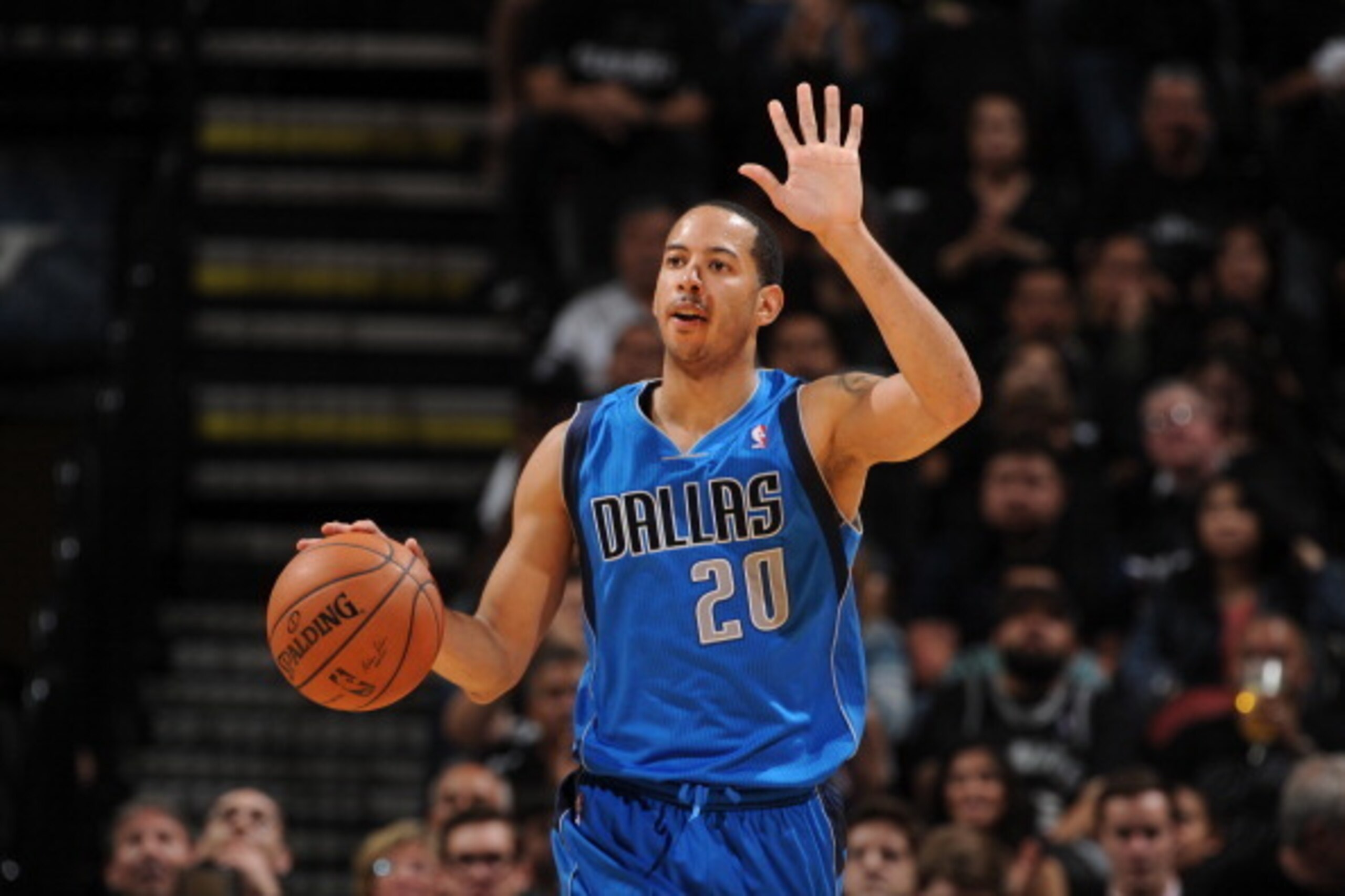 SAN ANTONIO, TX - APRIL 20: Devin Harris #20 of the Dallas Mavericks dribbles the ball during Game One of the Western Conference Quarterfinals during the 2014 NBA Playoffs against the San Antonio Spurs on April 20, 2014 at the AT&T Center in San Antonio, 