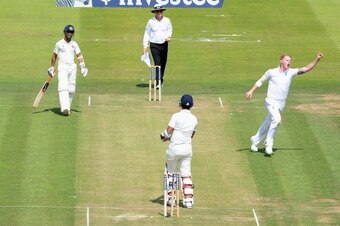 LONDON, ENGLAND - JULY 17:  Ben Stokes of England celebrates bowling Cheteshwar Pujara of India during day one of 2nd Investec Test match between England and India at Lord's Cricket Ground on July 17, 2014 in London, United Kingdom.  (Photo by Gareth Copl