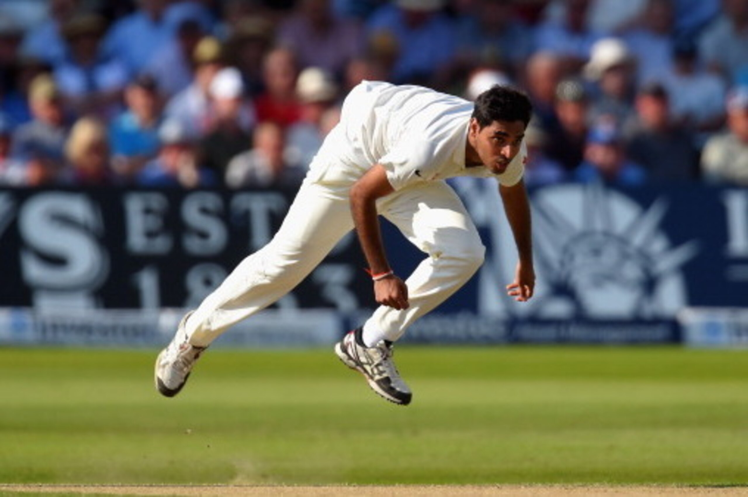 NOTTINGHAM, ENGLAND - JULY 10:  India bowler Bhuvneshwar Kumar  in action during day two of the 1st  Investec Test Match between England and India at  Trent Bridge on July 10, 2014 in Nottingham, England.  (Photo by Stu Forster/Getty Images)