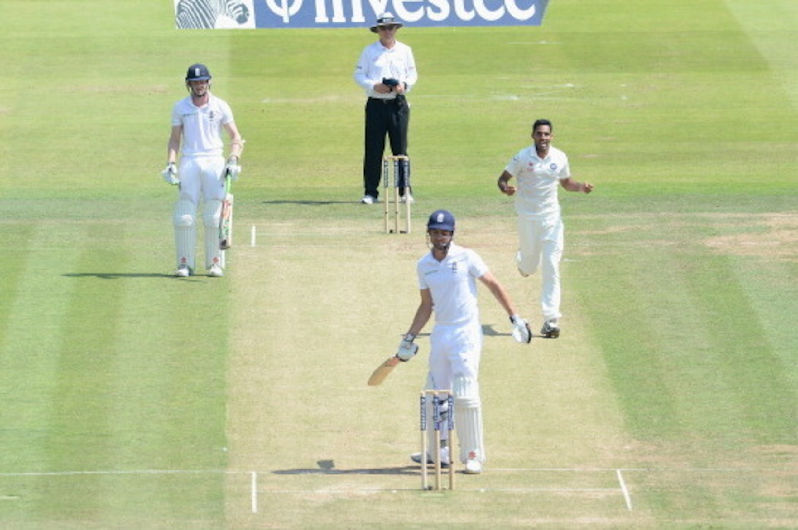 LONDON, ENGLAND - JULY 18:  Bhuvneshwar Kumar of India celebrates dismissing England captain Alastair Cook during day two of 2nd Investec Test match between England and India at Lord's Cricket Ground on July 18, 2014 in London, United Kingdom.  (Photo by 
