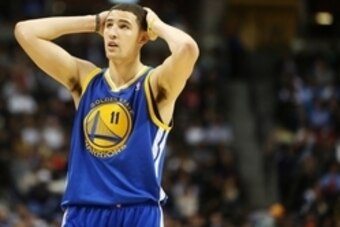 January 13, 2013; Denver, CO, USA; Golden State Warriors guard Klay Thompson (11) during the first half against the Denver Nuggets at the Pepsi Center.  The Nuggets won 116-105.  Mandatory Credit: Chris Humphreys-USA TODAY Sports