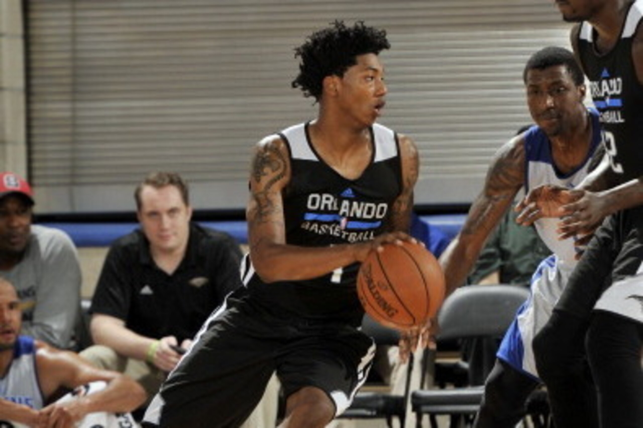 ORLANDO, FL - JULY 11: Elfrid Payton #4 of the Orlando Magic drives against the Detroit Pistons during the Samsung NBA Summer League 2014 during the Samsung NBA Summer League 2014 on July 11, 2014 at Amway Center in Orlando, Florida. NOTE TO USER: User ex