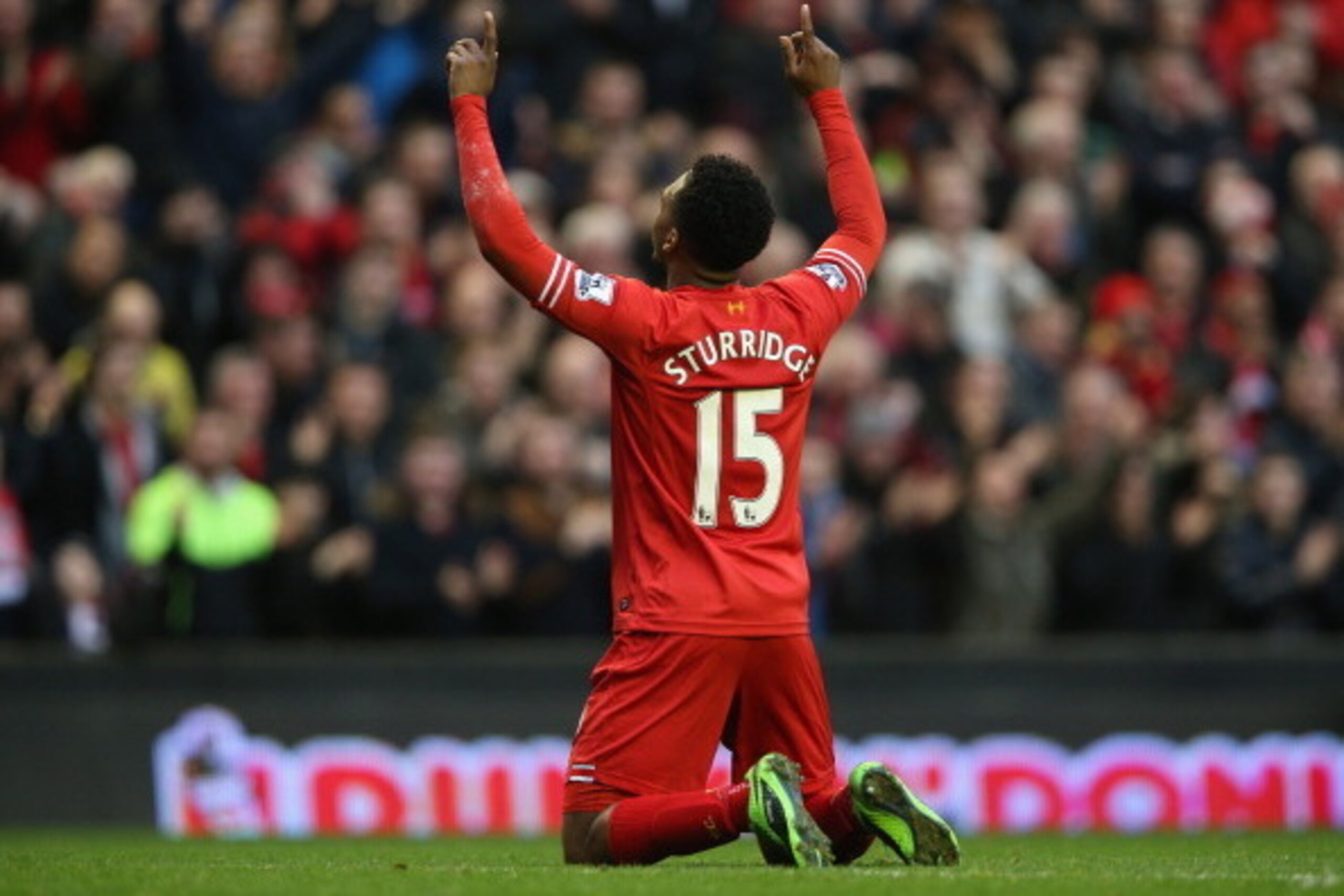 LIVERPOOL, ENGLAND - FEBRUARY 23:  Daniel Sturridge of Liverpool celebrates scoring his team's third goal during the Barclays Premier League match between Liverpool and Swansea City at Anfield on February 23, 2014 in Liverpool, England.  (Photo by Clive B