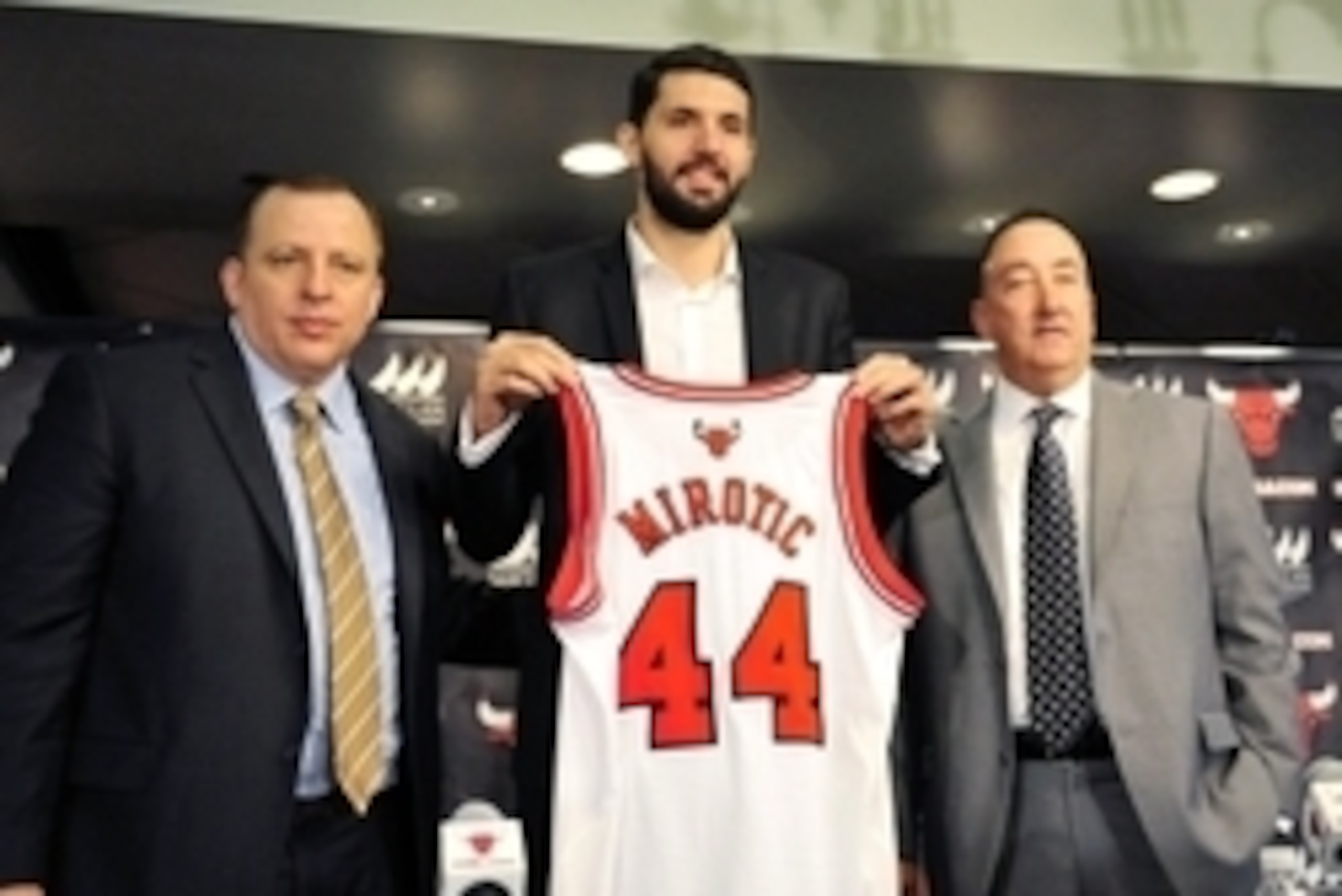 Jul 18, 2014; Chicago, IL, USA;  Chicago Bulls head coach Tom Thibodeau (left), new player Nikola Mirotic (middle) and general manager Gar Forman pose for a photo after a press conference at the United Center. Mandatory Credit: David Banks-USA TODAY Sport