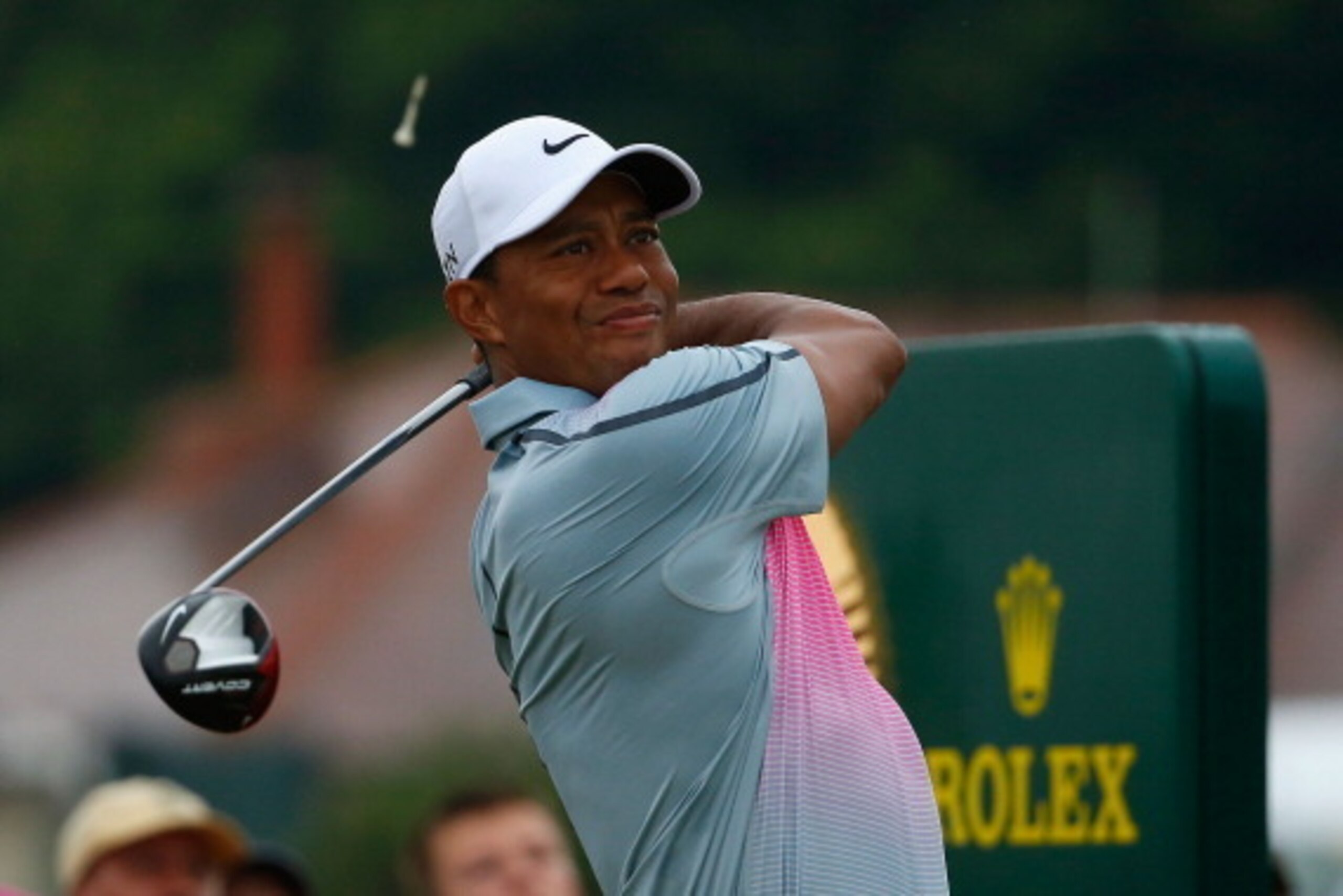 HOYLAKE, ENGLAND - JULY 19:  Tiger Woods of the United States tees off on the 10th hole during the third round of The 143rd Open Championship at Royal Liverpool on July 19, 2014 in Hoylake, England.  (Photo by Tom Pennington/Getty Images)