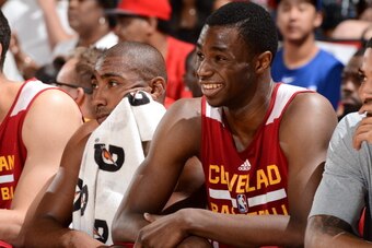 LAS VEGAS, NV - JULY 13: Andrew Wiggins #21 of the Cleveland Cavaliers smile on the bench during the game against the San Antonio Spurs on July 13, 2014 at Cox Pavilion in Las Vegas, Nevada. NOTE TO USER: User expressly acknowledges and agrees that, by do